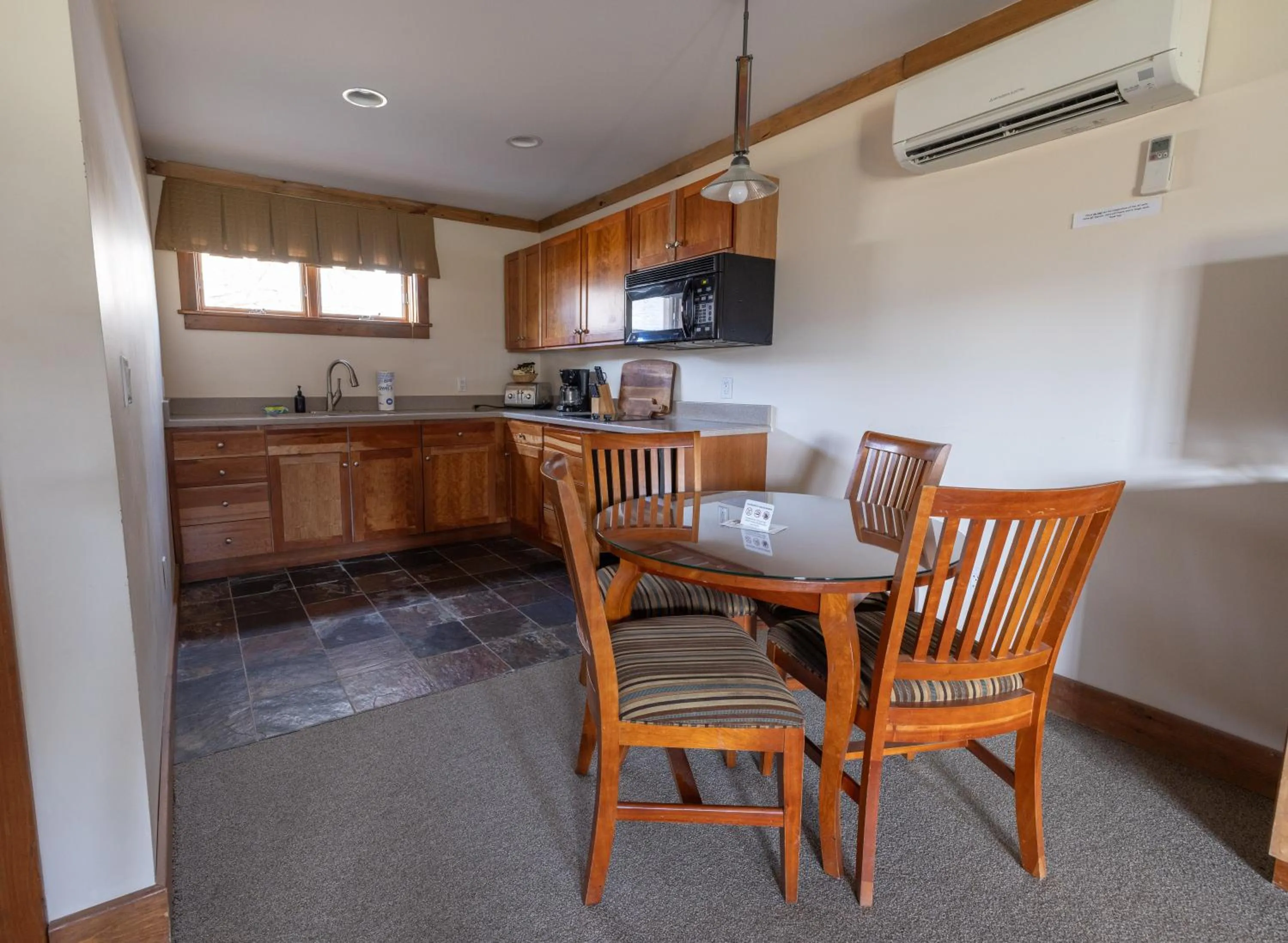 Dining area in Winwood Condominiums by Windham Mountain Club