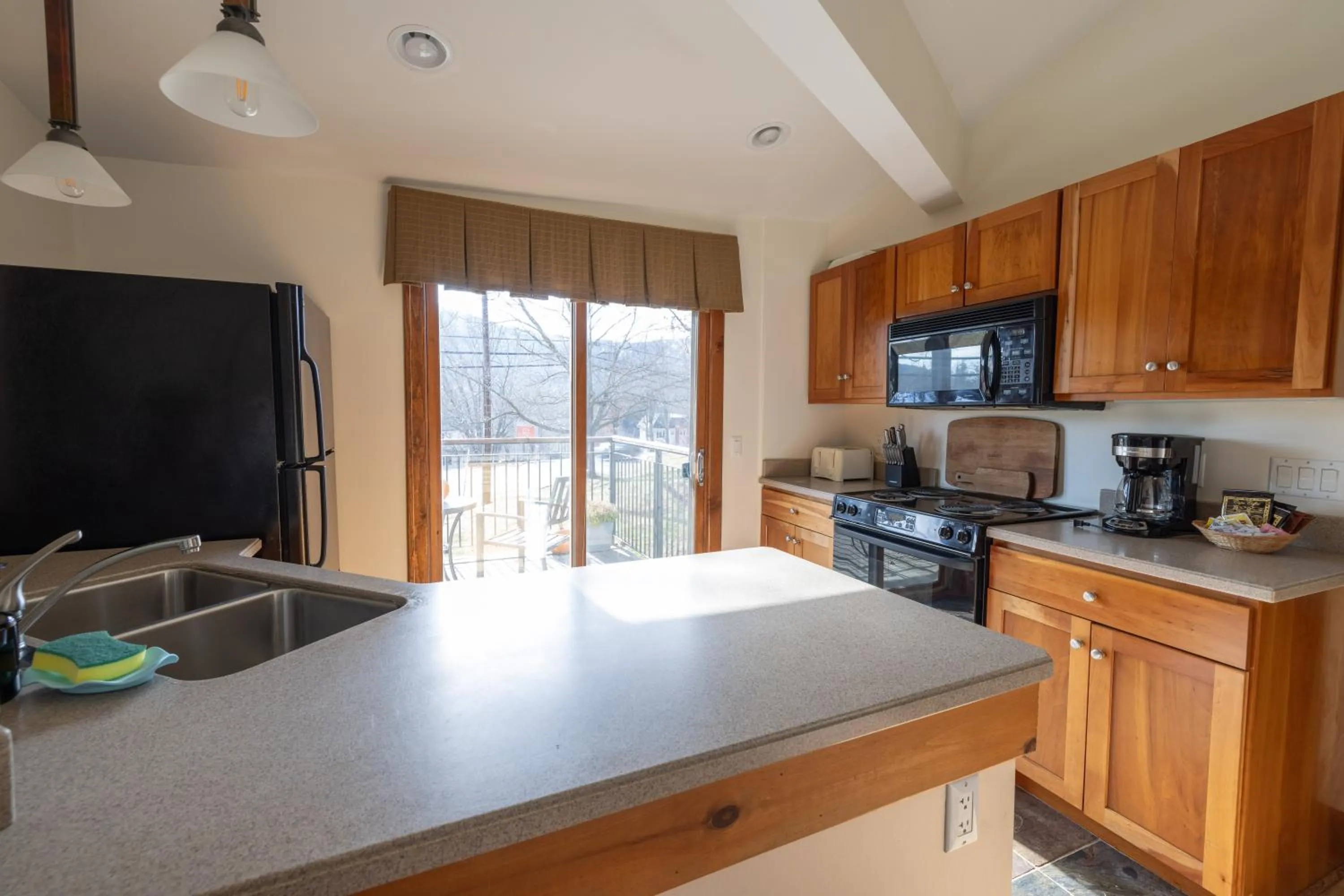 Kitchen or kitchenette in Winwood Condominiums by Windham Mountain Club