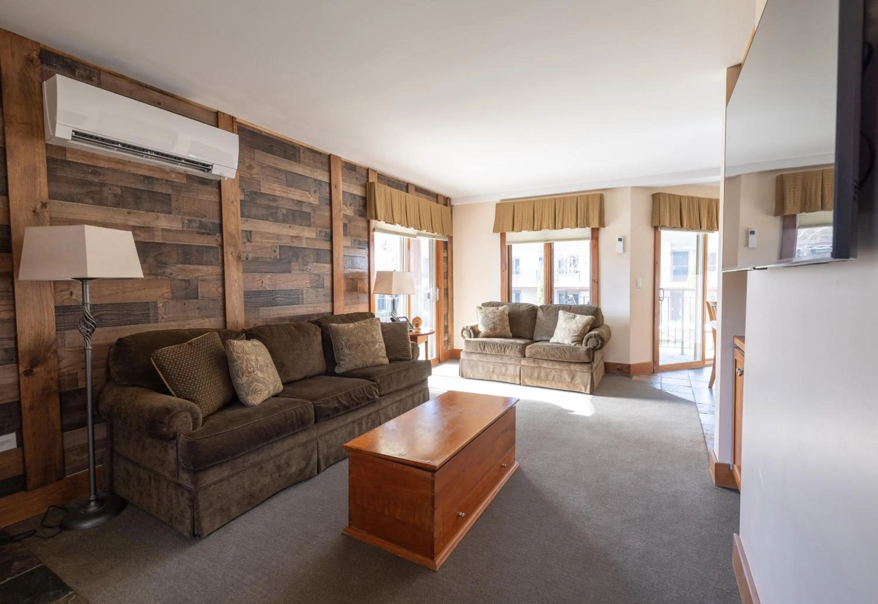 Living room in Winwood Condominiums by Windham Mountain Club