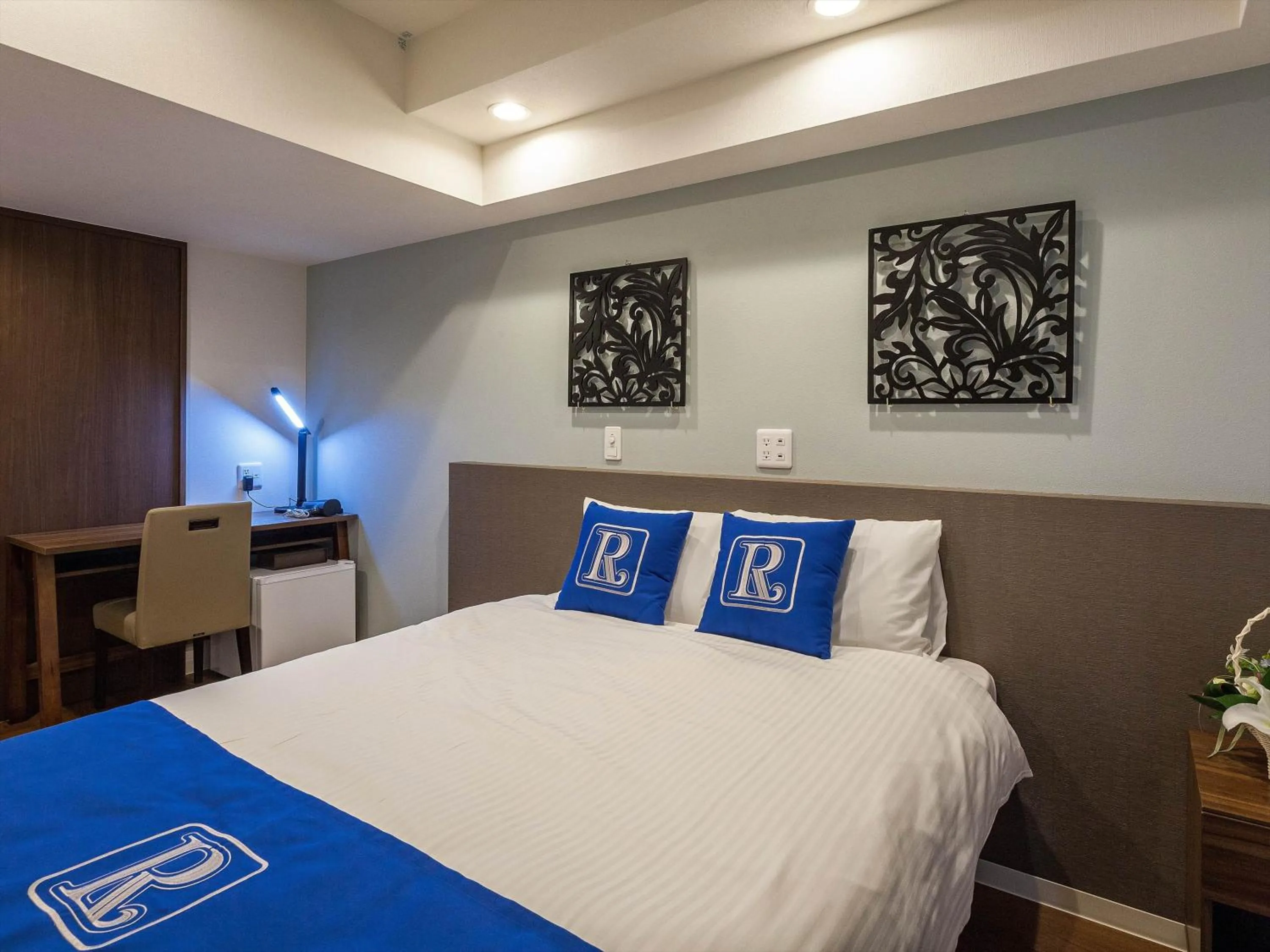 Bed in Living Inn Asahibashiekimae Premier