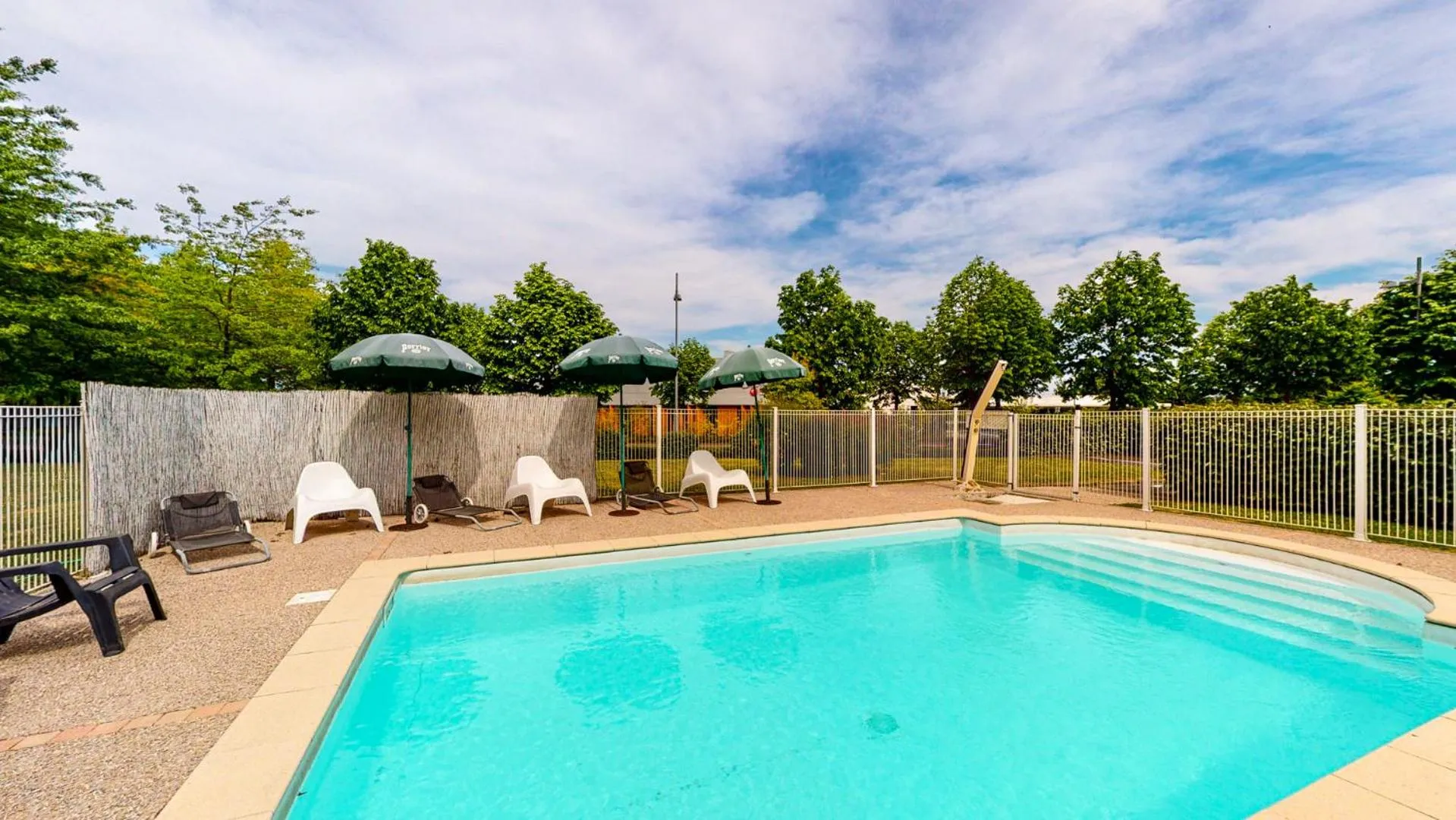 Swimming pool in Ever Route 64 Brit Hotel Tarbes Ibos