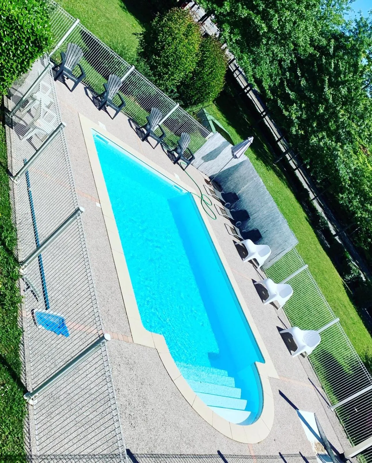 Swimming pool in Ever Route 64 Brit Hotel Tarbes Ibos