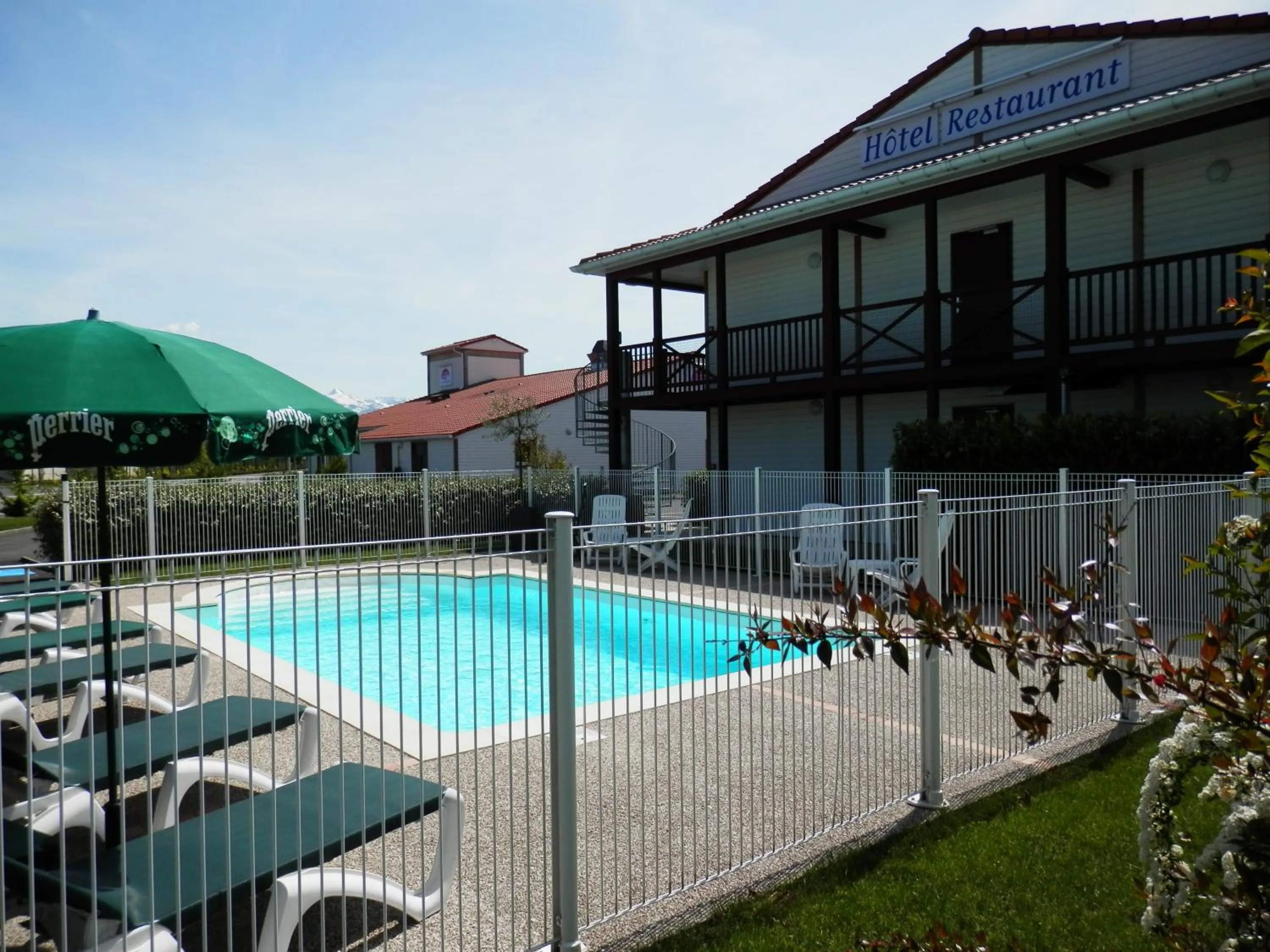 Swimming pool in Ever Route 64 Brit Hotel Tarbes Ibos