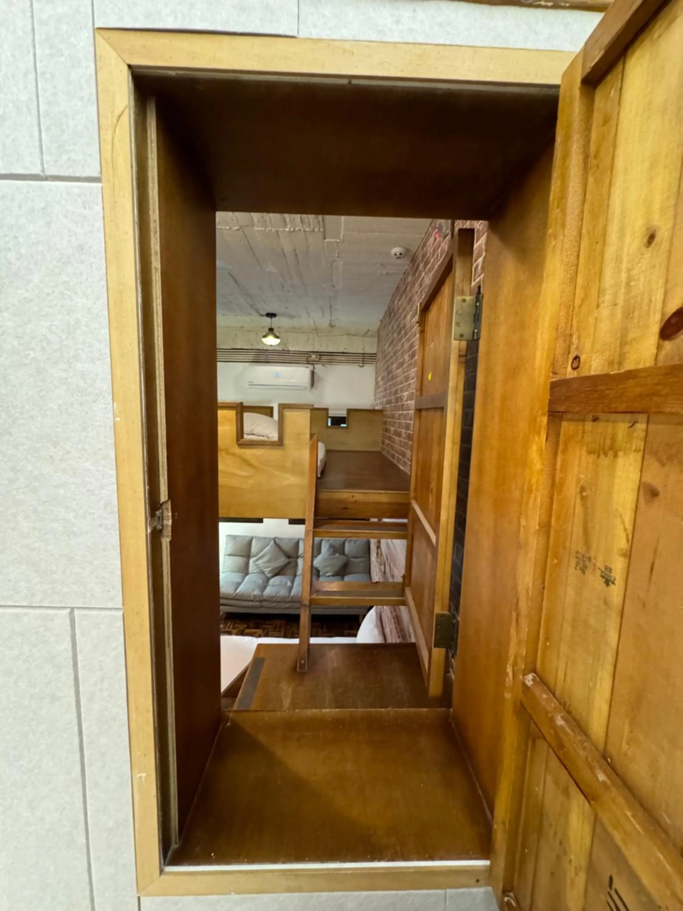 Bed in 慢步南國 台南故事民宿 Slow Tainan Homestay