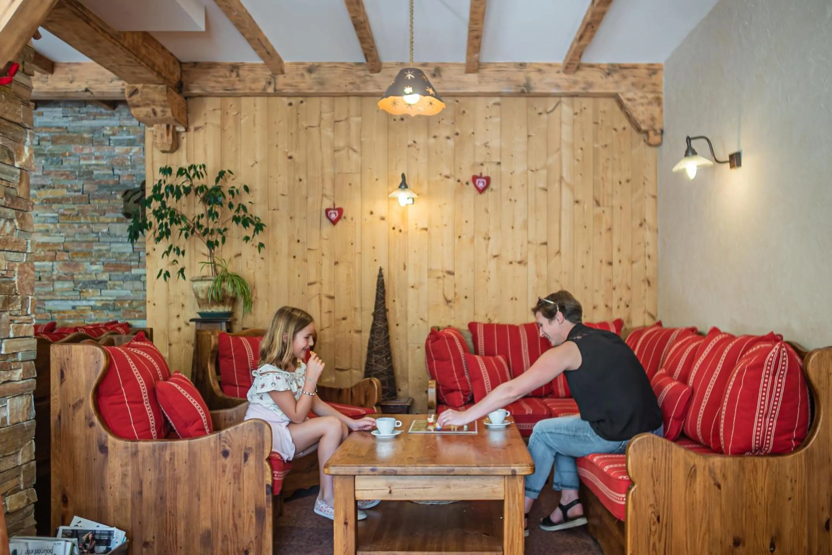 Communal lounge/ TV room in Hôtel Le Christania