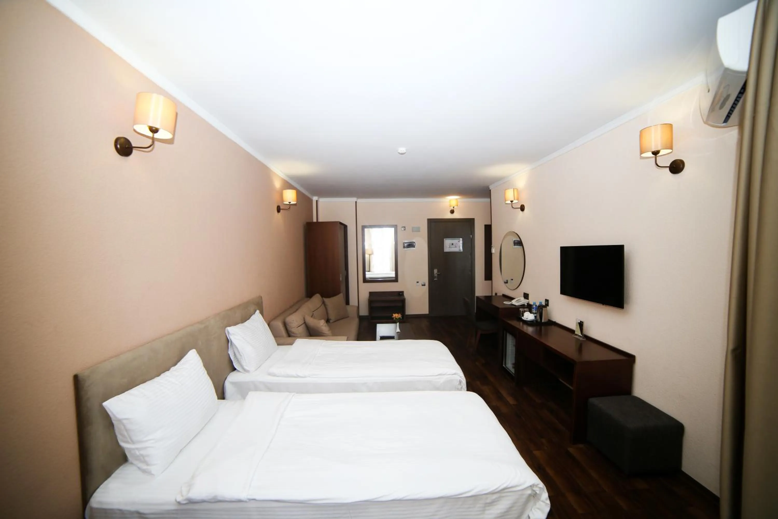 Bed in Hotel Corner Inn