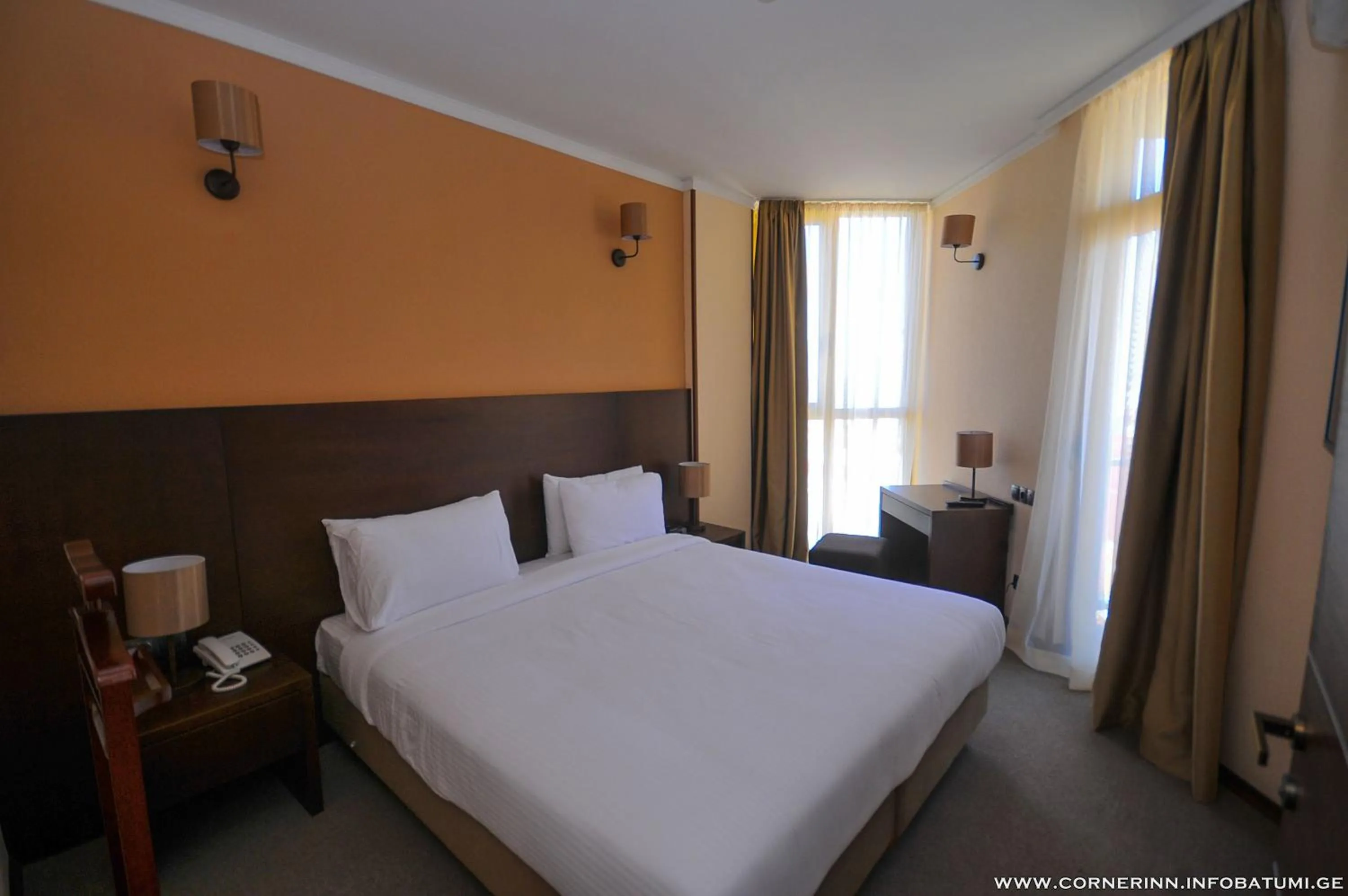 Bed in Hotel Corner Inn