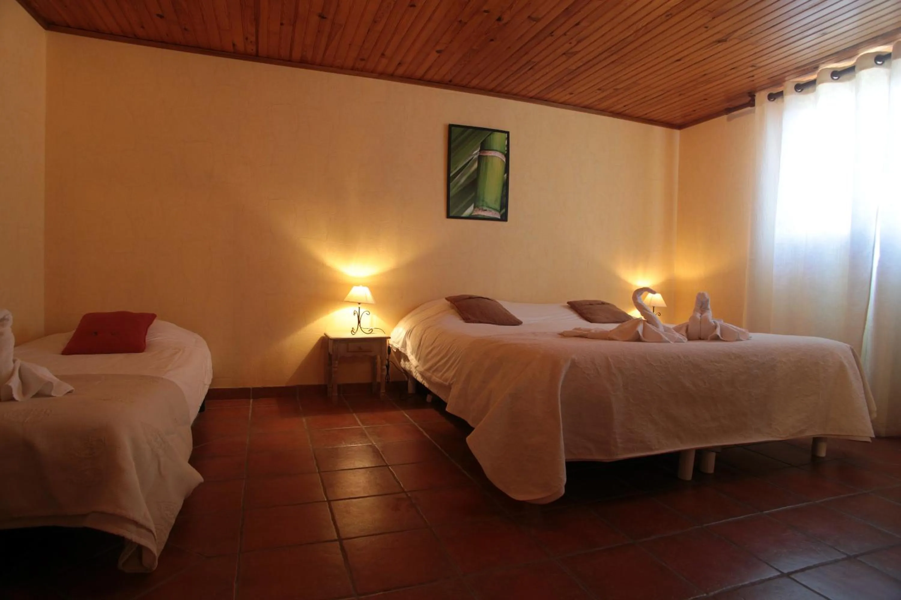 Bed in Logis Hôtel LE PRESSOIR