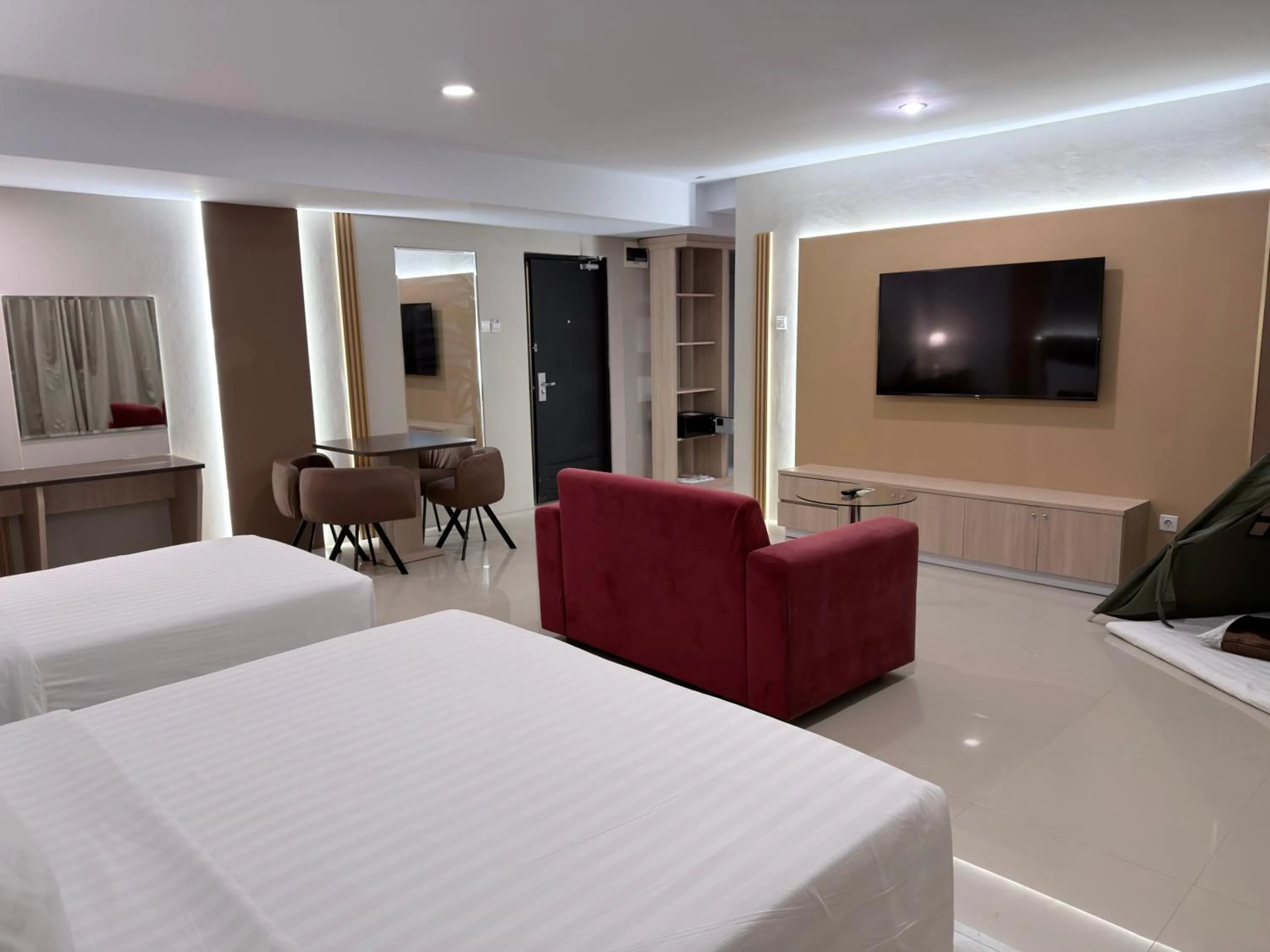 Bed in Swiss-Belhotel Makassar