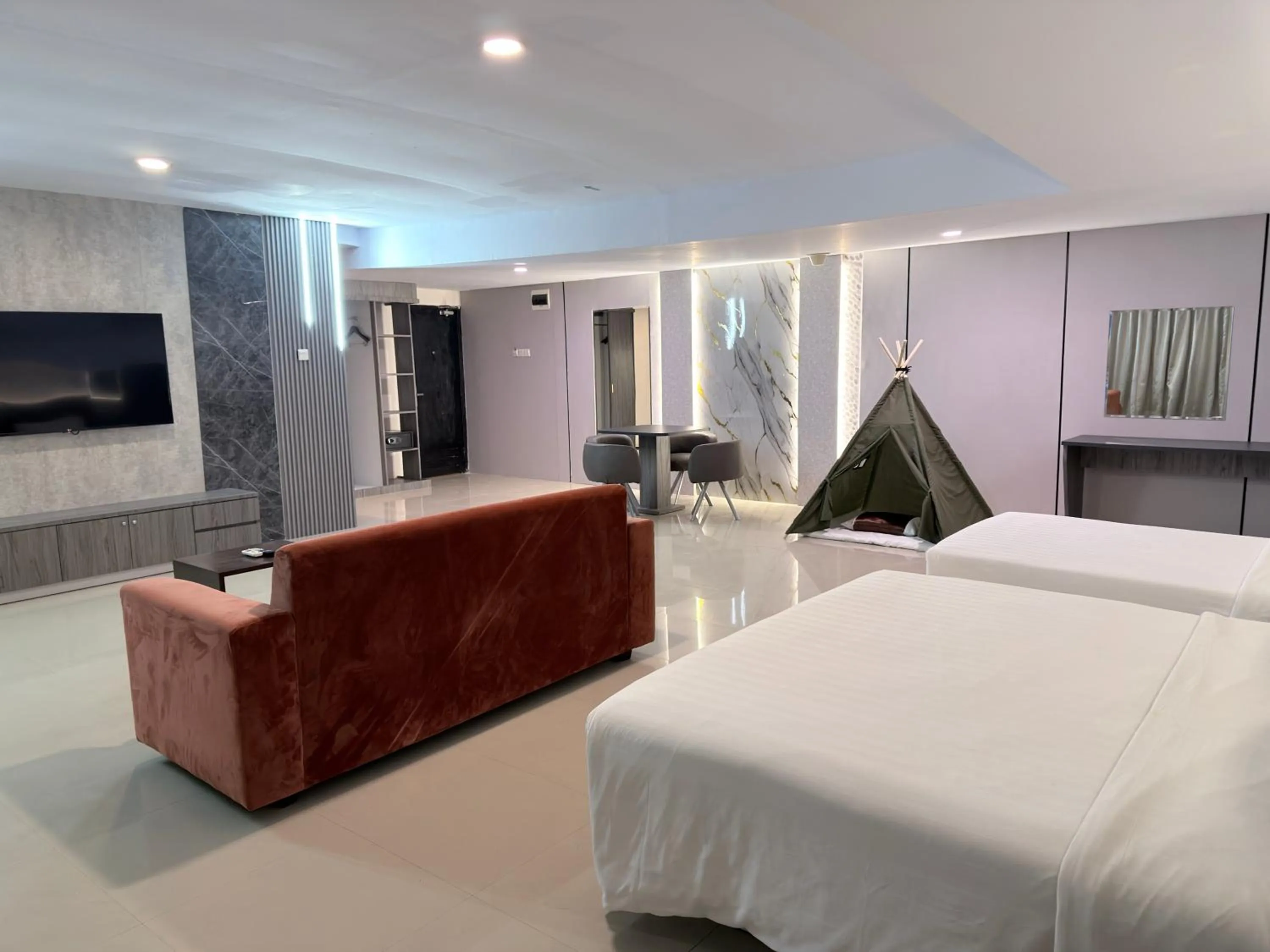 Bed in Swiss-Belhotel Makassar
