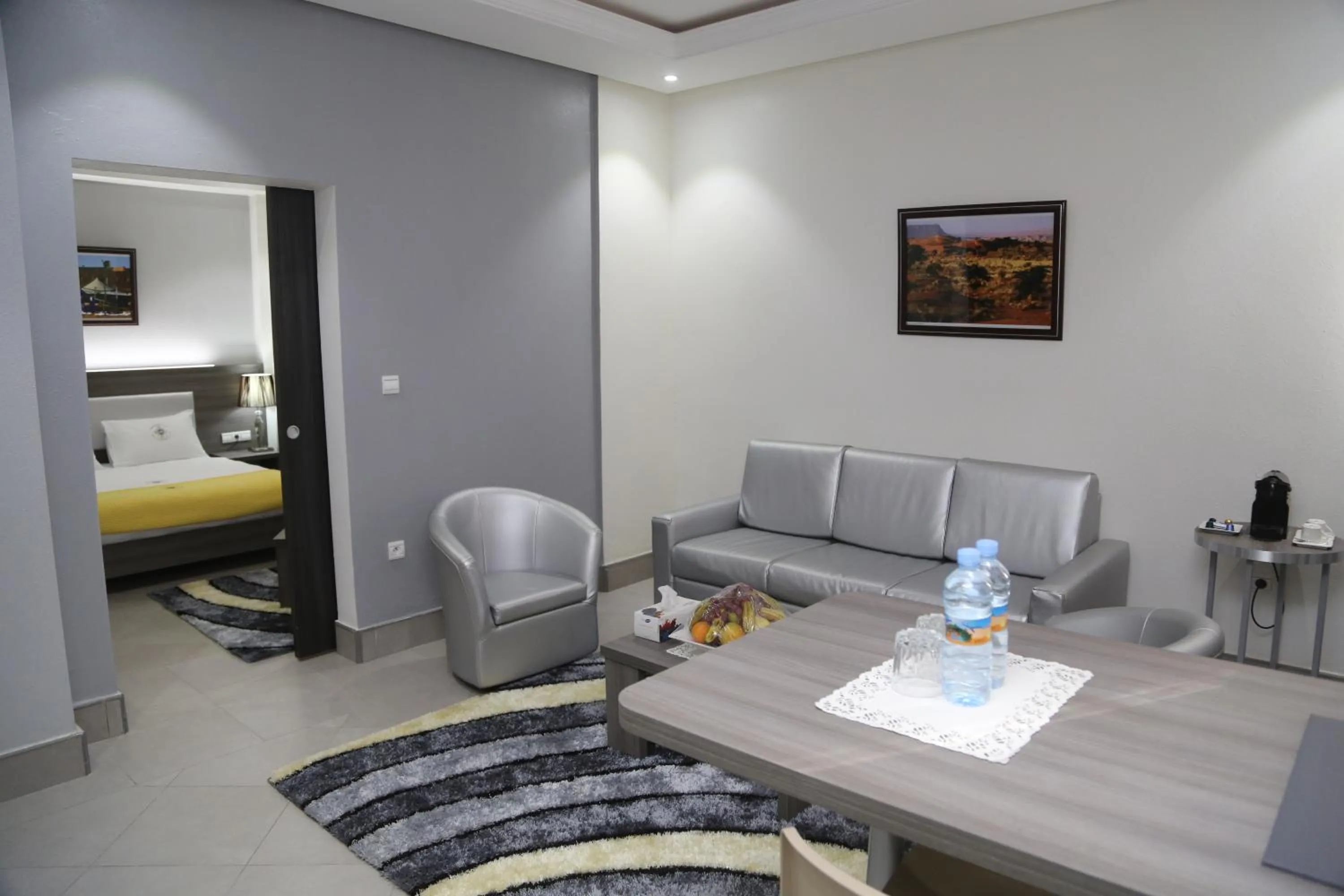 Living room, Bed in Nouakchott Hotel