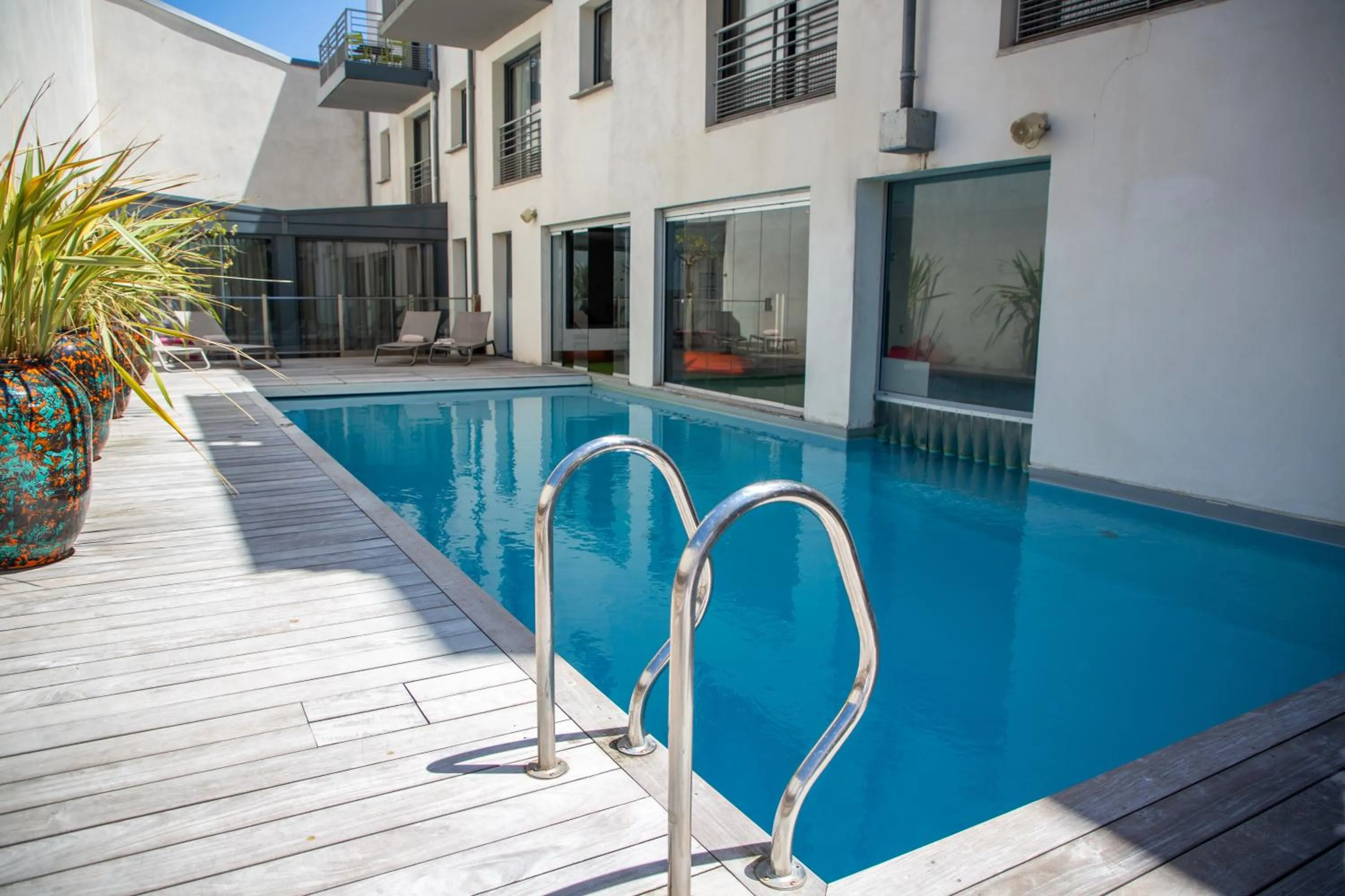 Swimming pool in Appart Hôtel Clément Ader