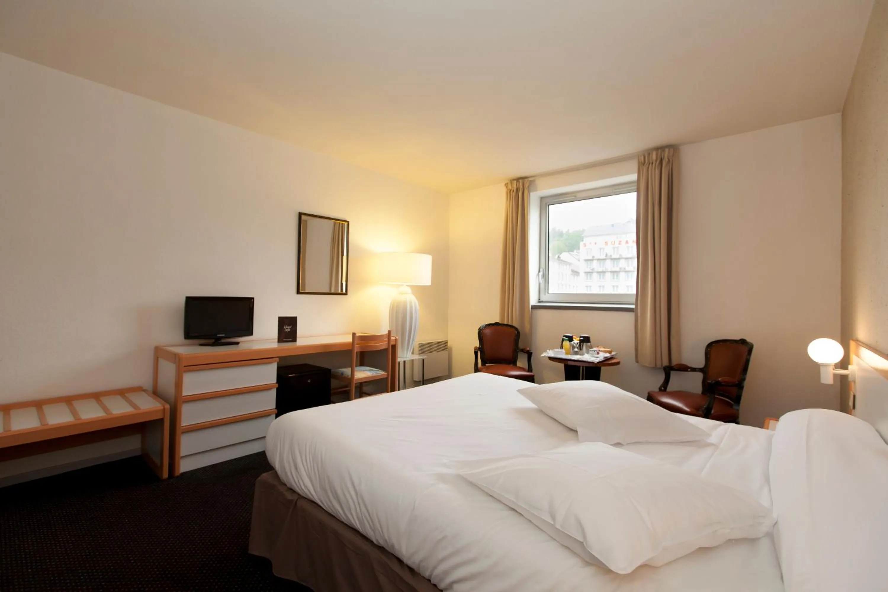 Bed in Hôtel Paradis