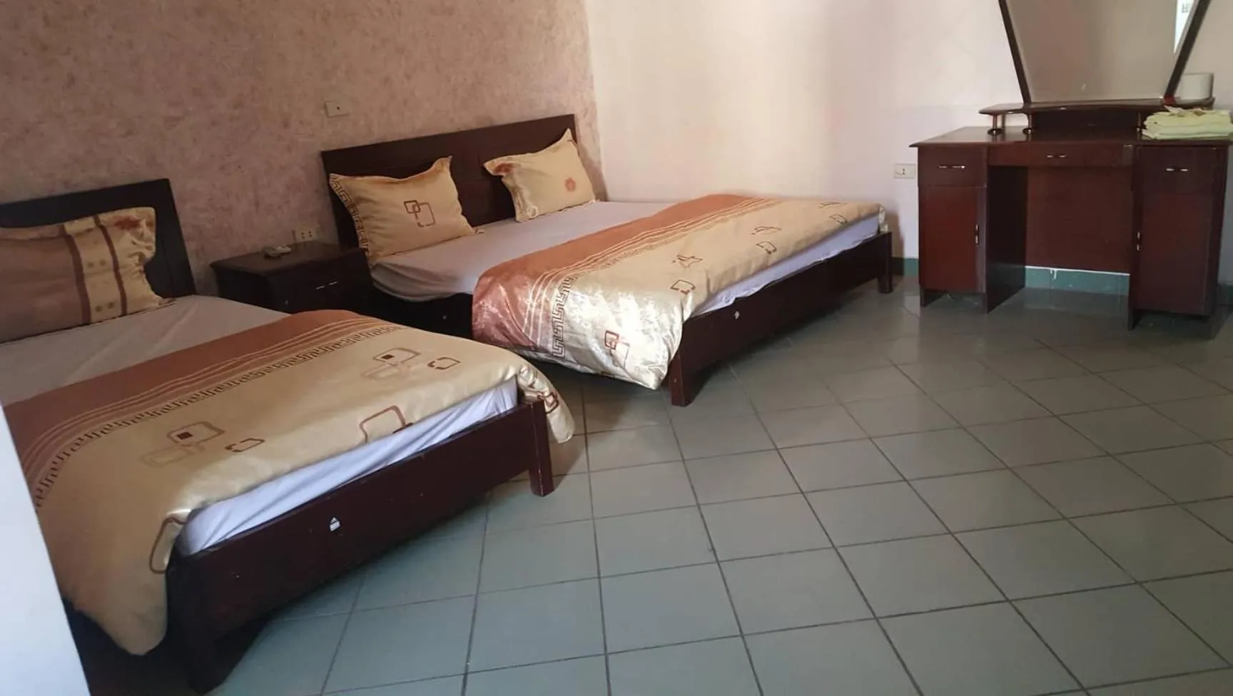 Bed in Hai Duong Hotel