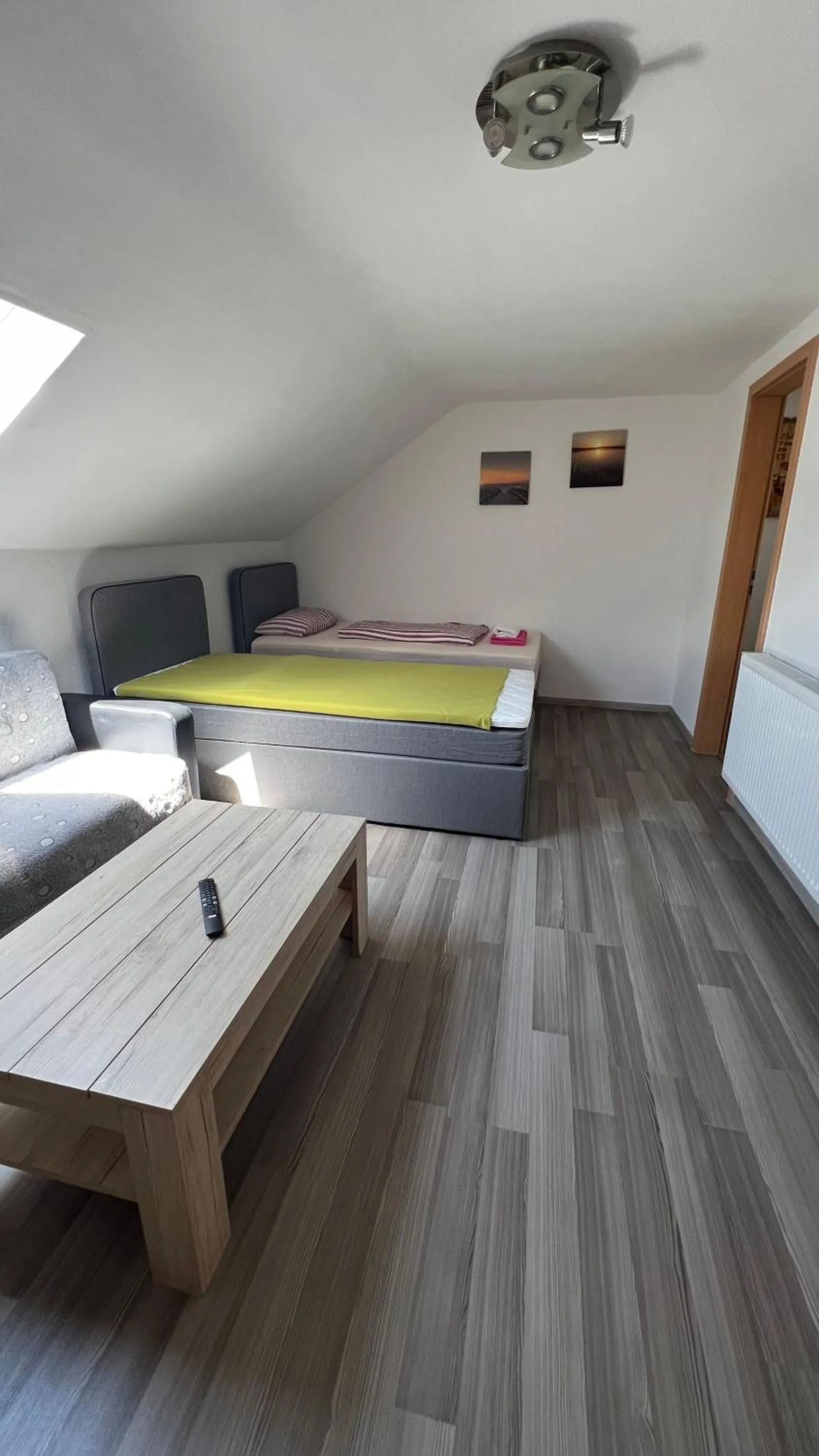 Communal lounge/ TV room in Ferienwohnung