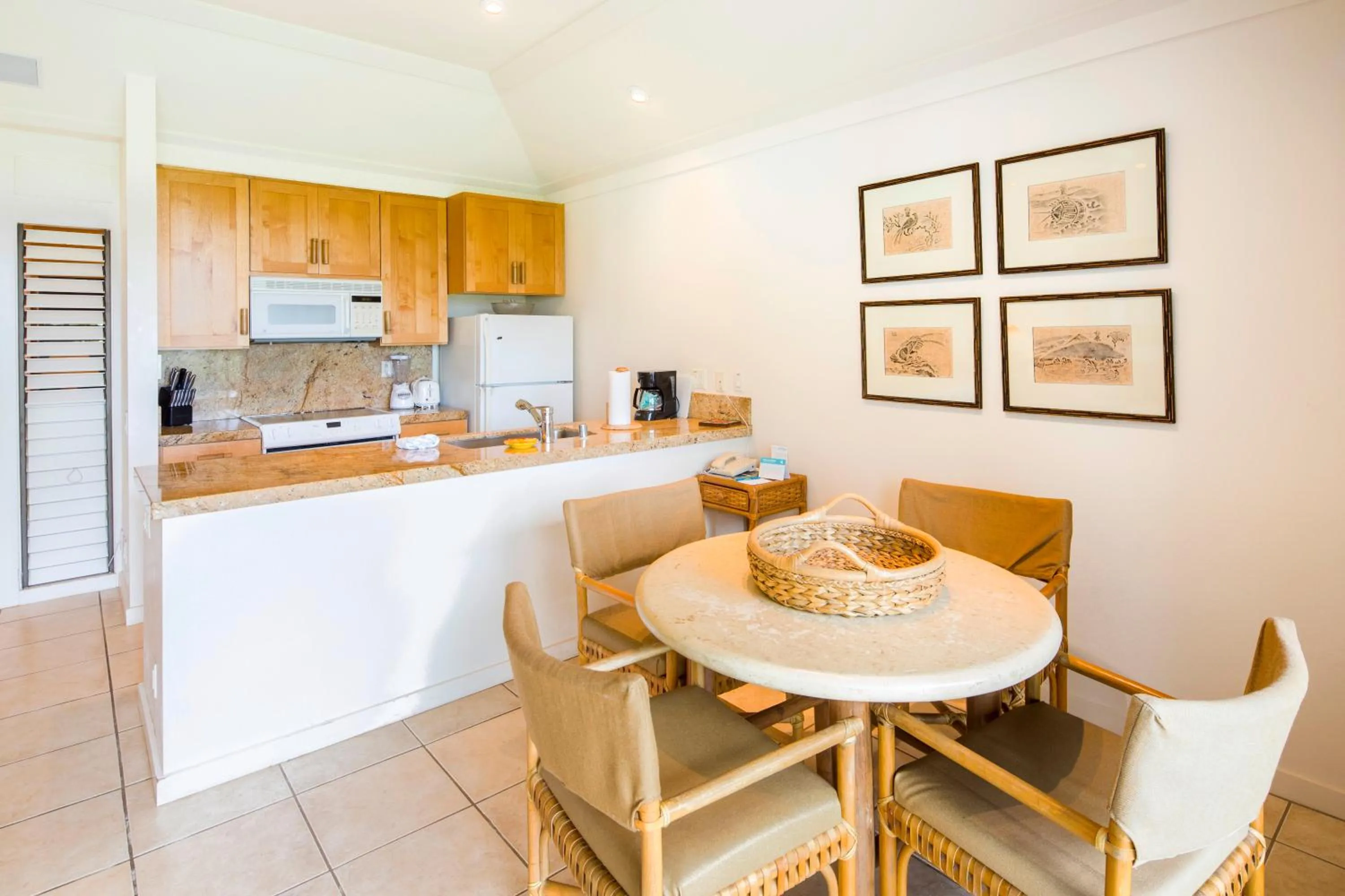 Dining area in Kiahuna Plantation and Beach Bungalows by Castle