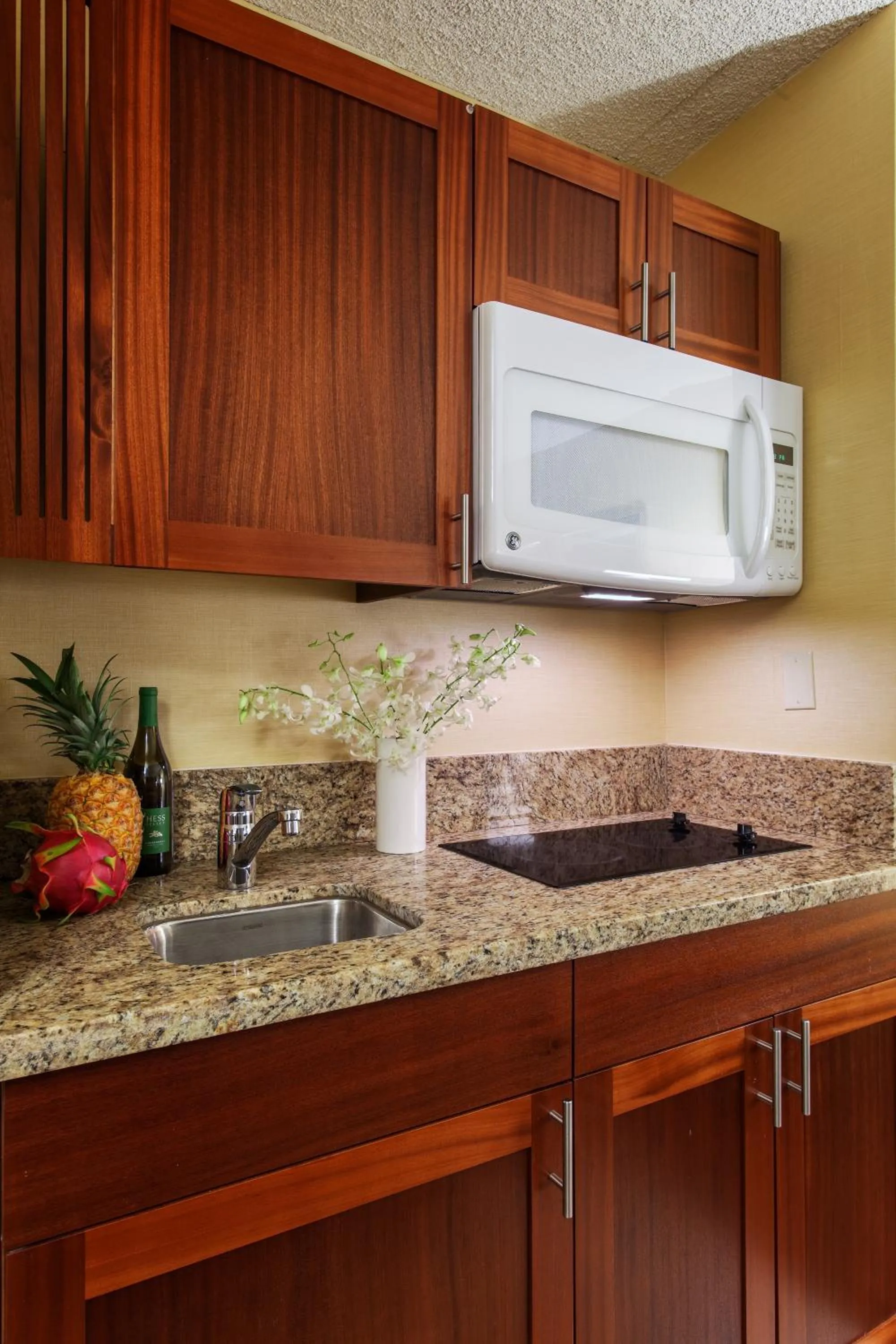Kitchen or kitchenette in Hilo Hawaiian Hotel, Trademark Collection by Wyndham