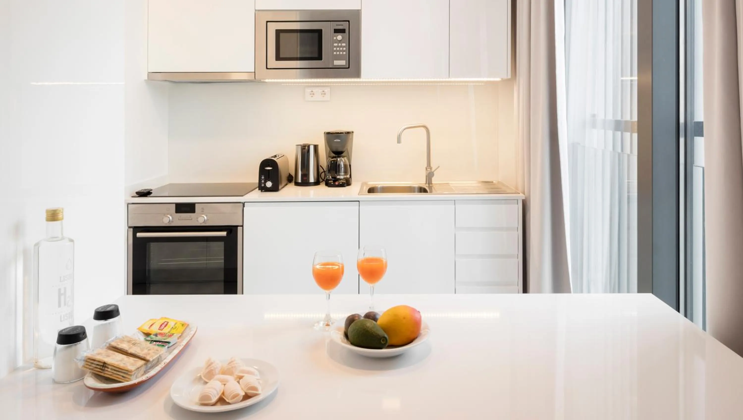 Kitchen or kitchenette in Lisbon Serviced Apartments - Parque