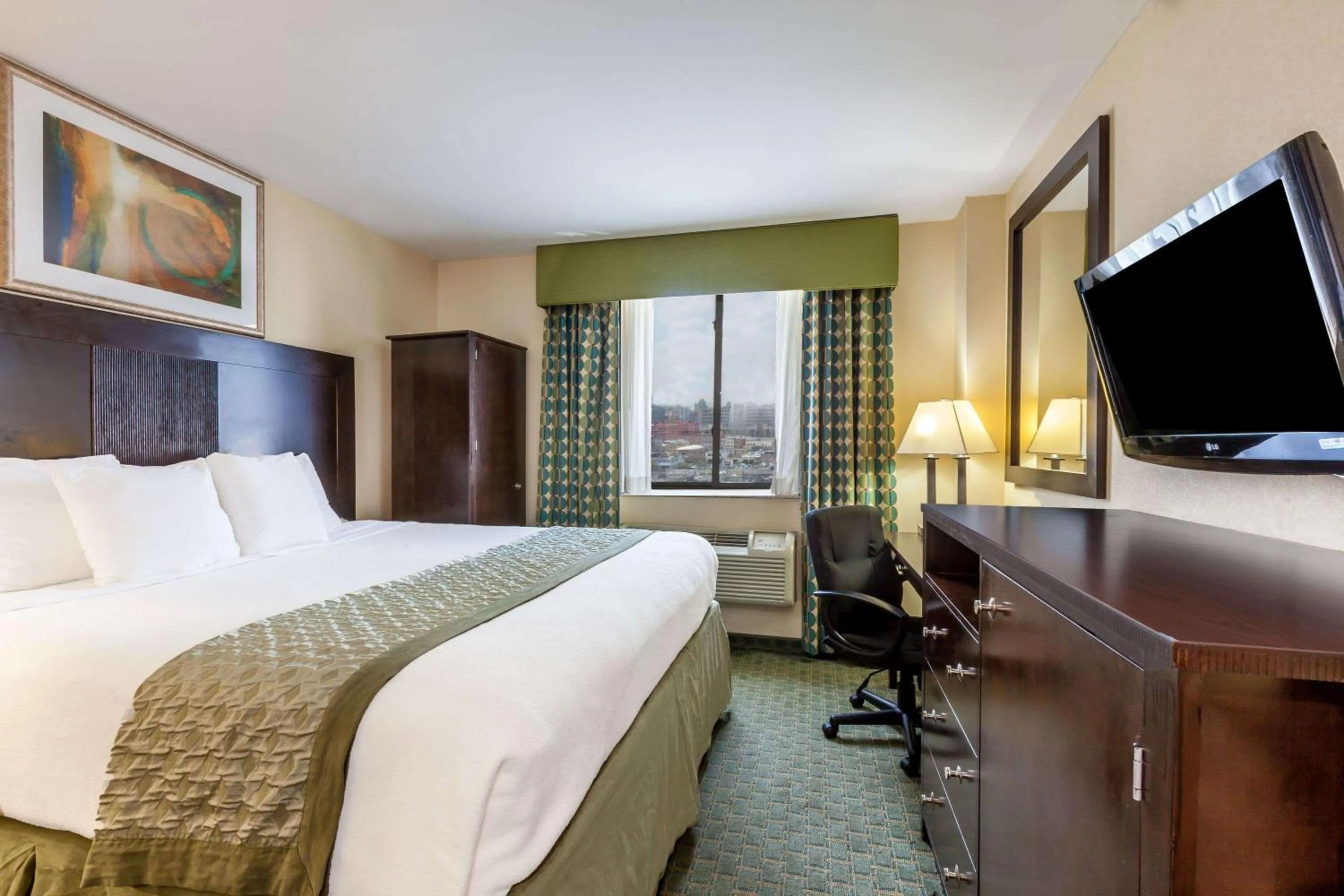 Photo of the whole room, TV/Entertainment Center in Royal Stay Hotel