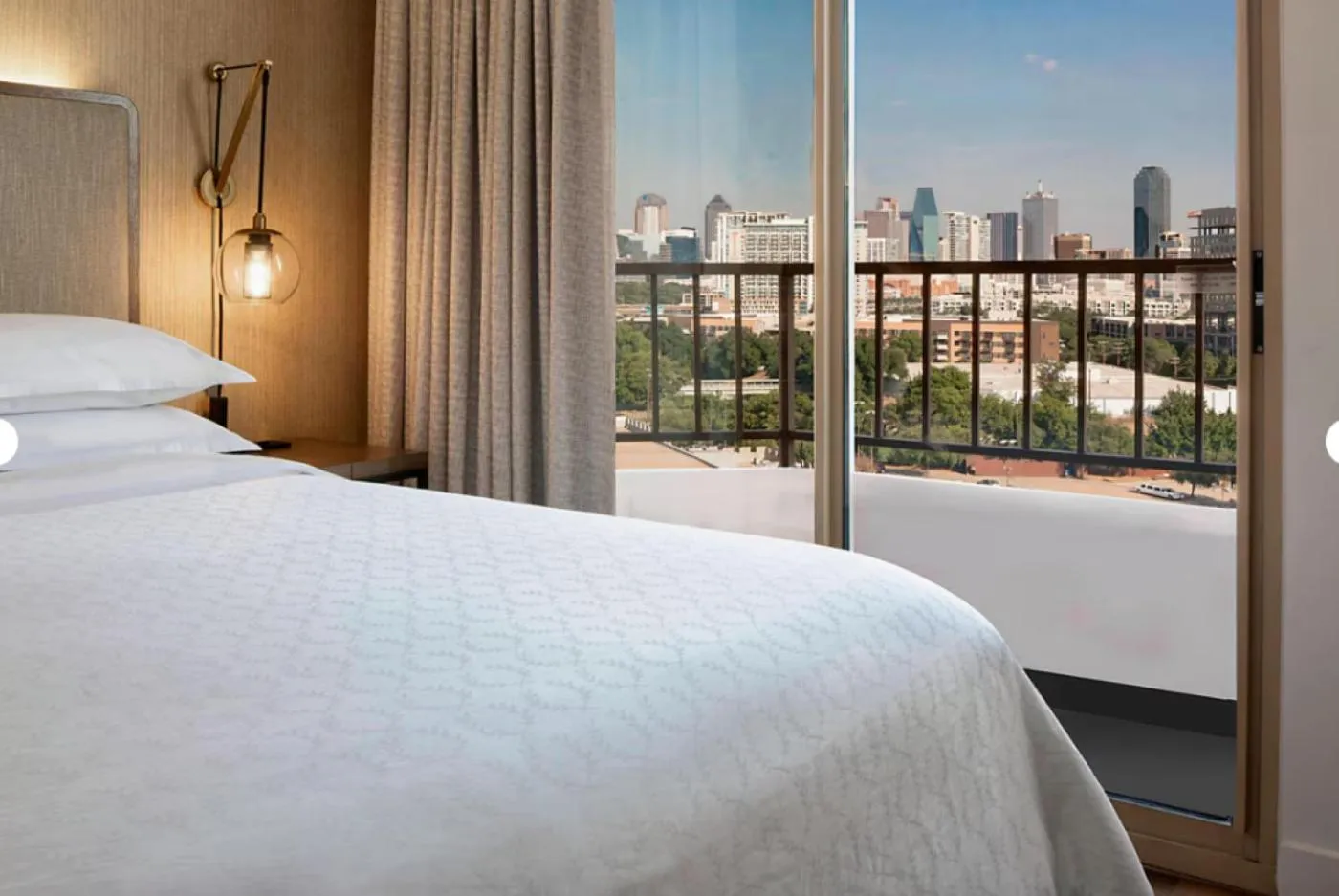 View (from property/room), Bed in Sheraton Suites Market Center Dallas