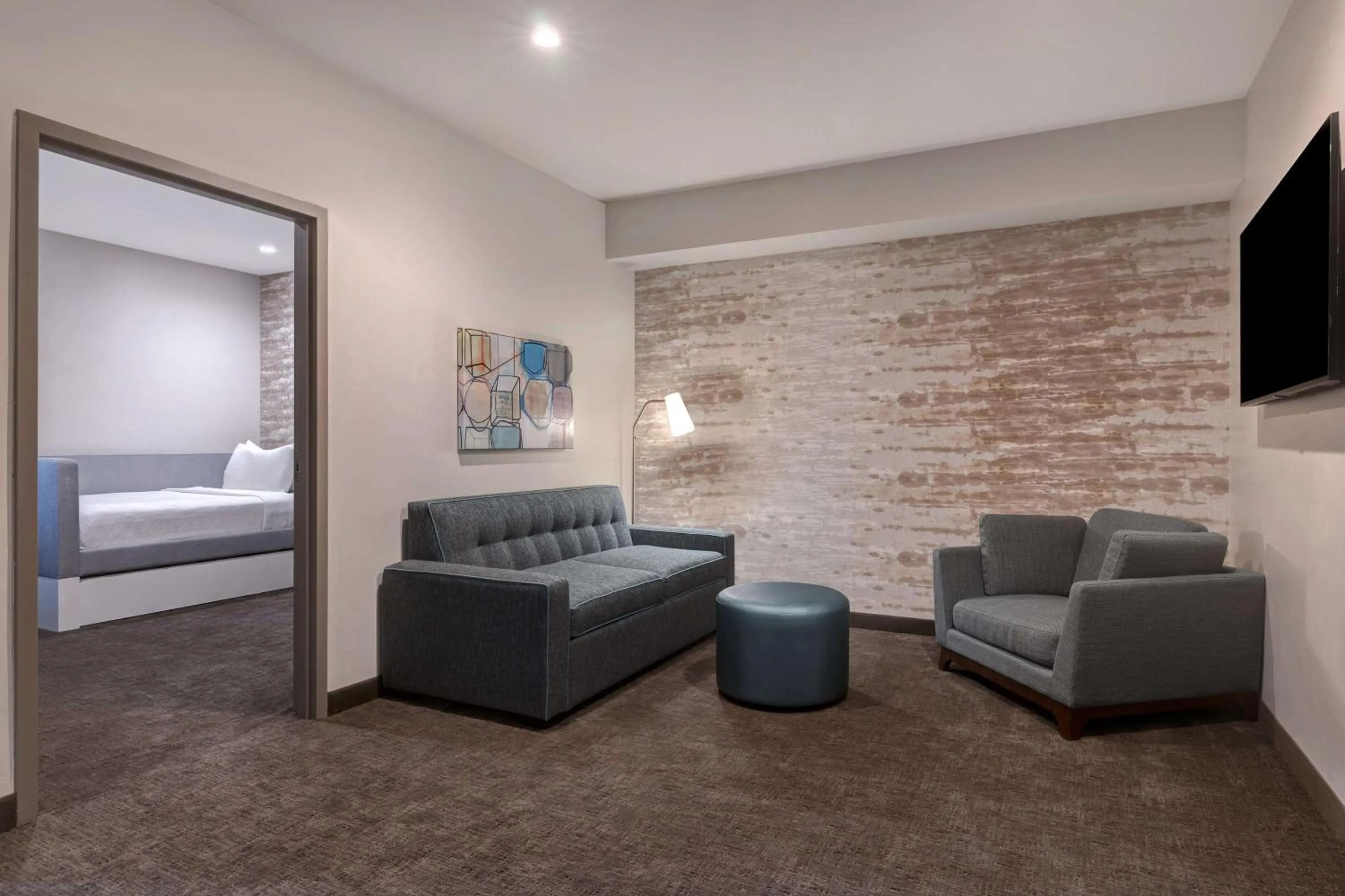 Living room, Bed in Home2 Suites By Hilton Anaheim Resort