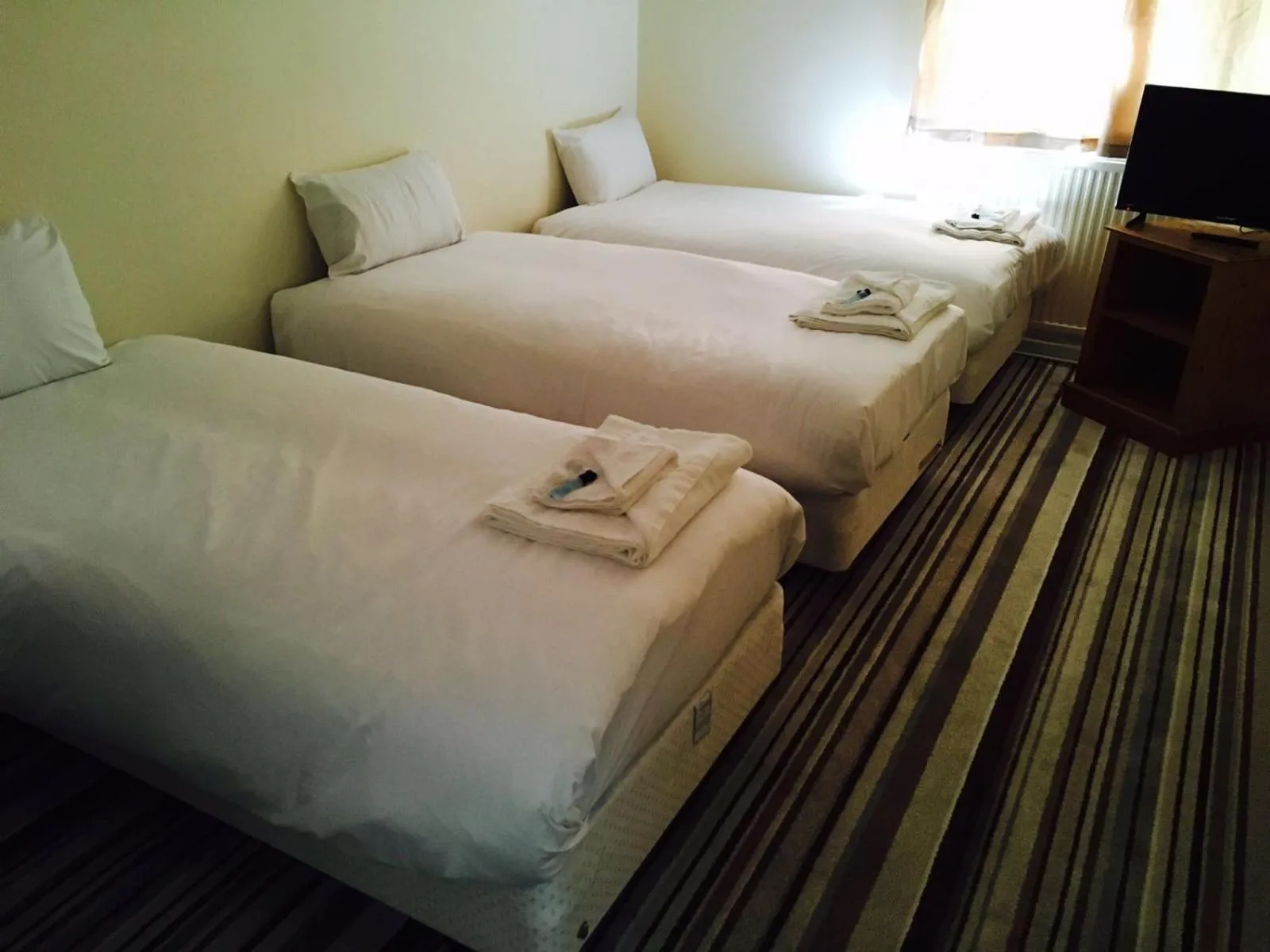 Bed in The Tudor House Hotel