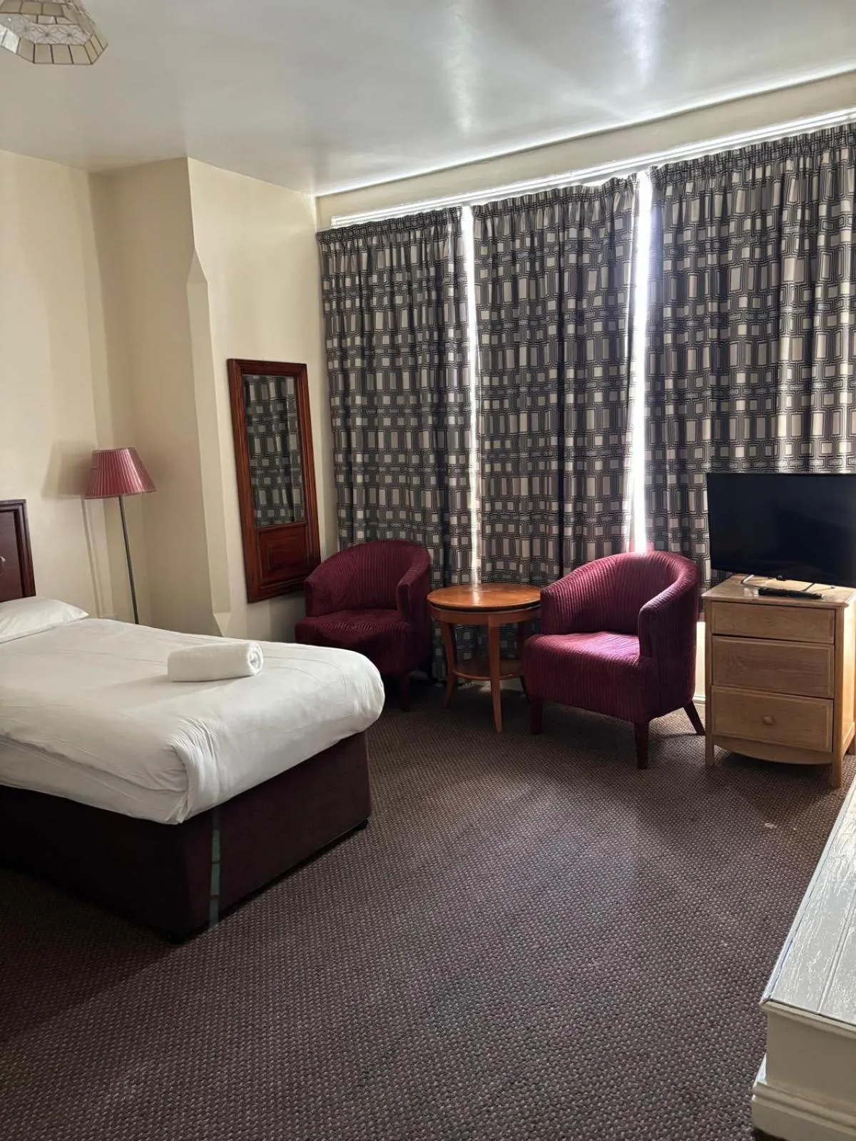 Bed in The Tudor House Hotel