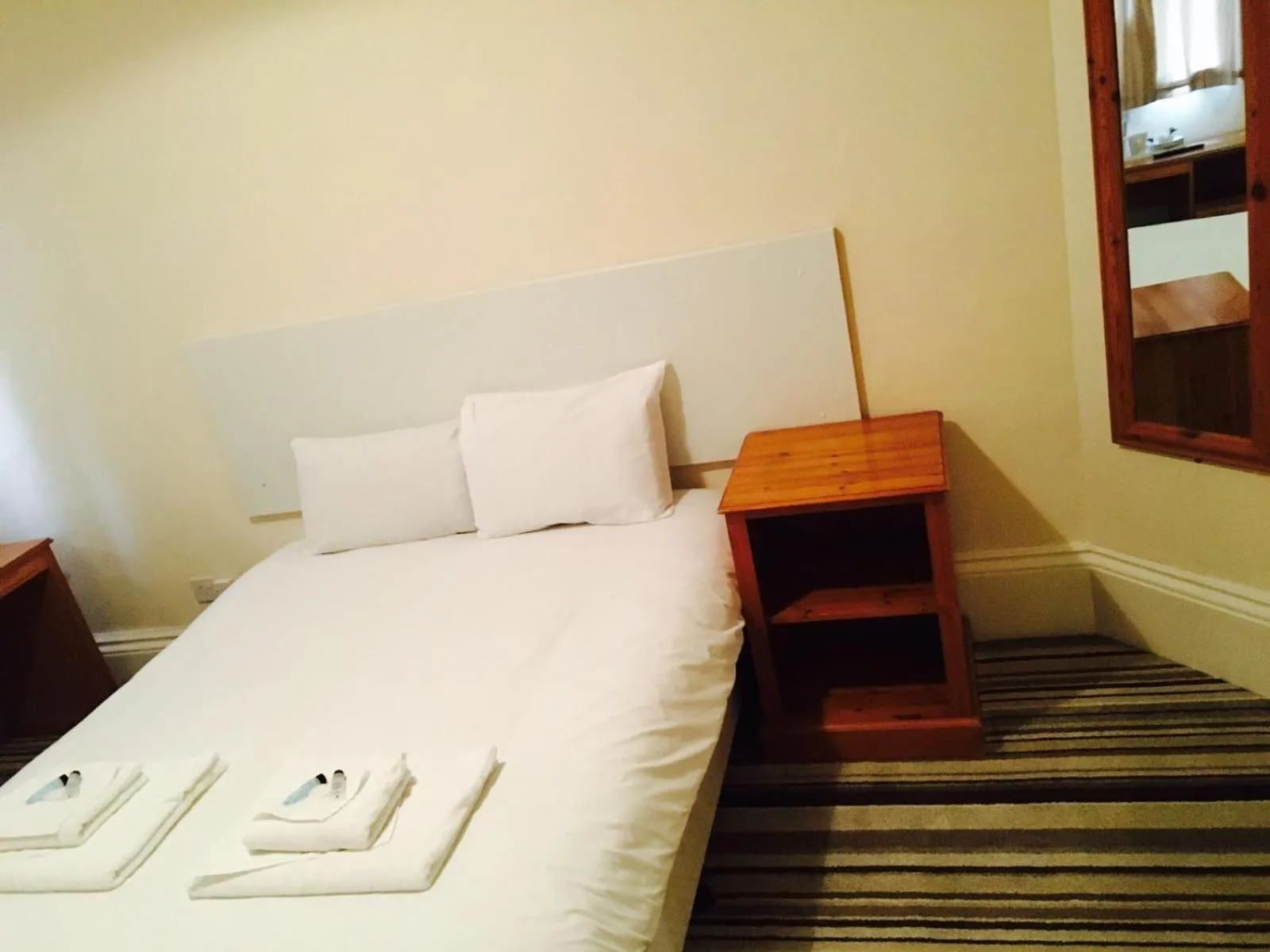 Bed in The Tudor House Hotel