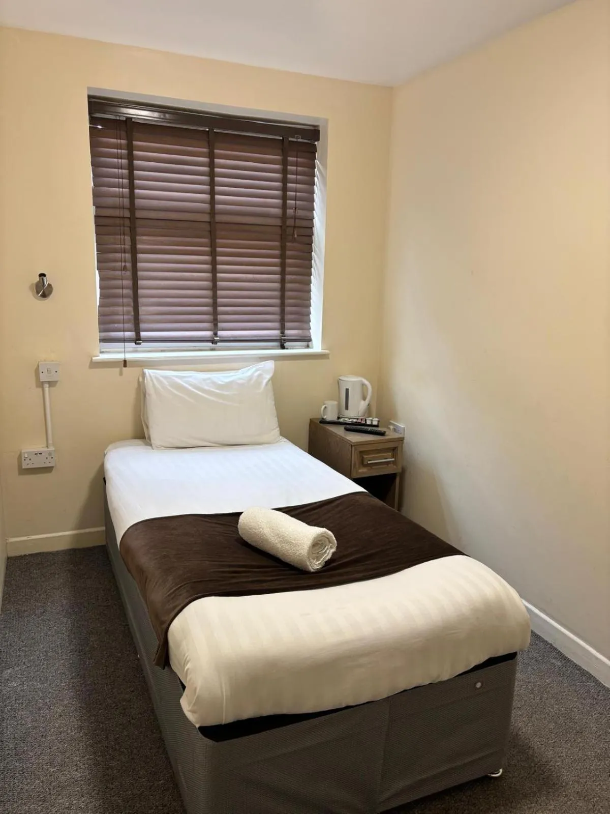 Bed in The Tudor House Hotel