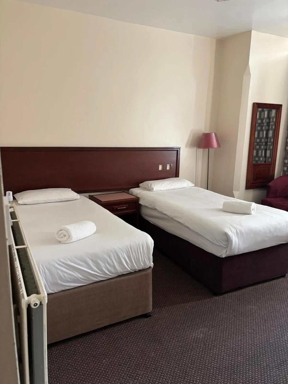 Bed in The Tudor House Hotel