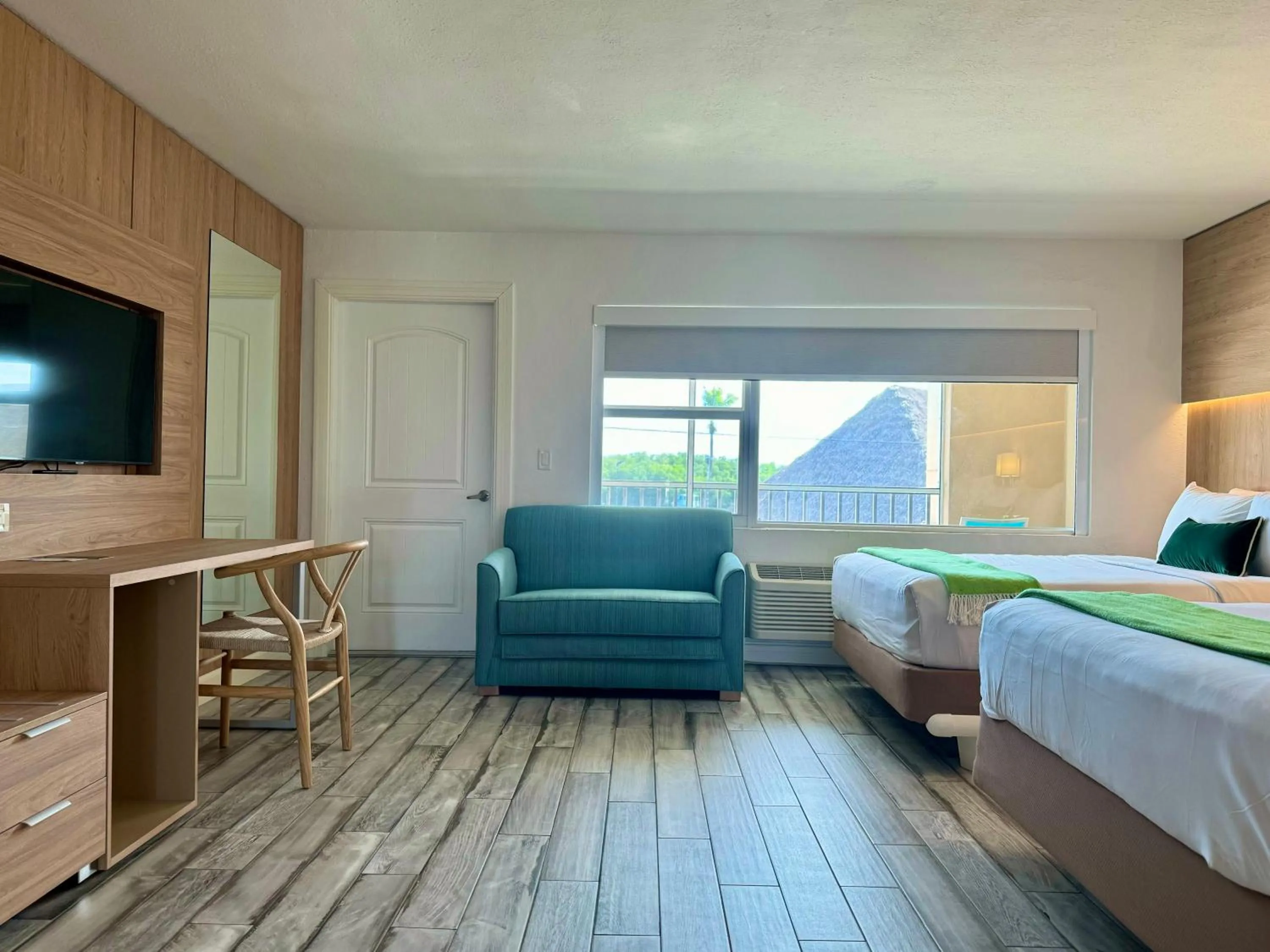 Seating area, Bed in Gilbert's Resort & Marina