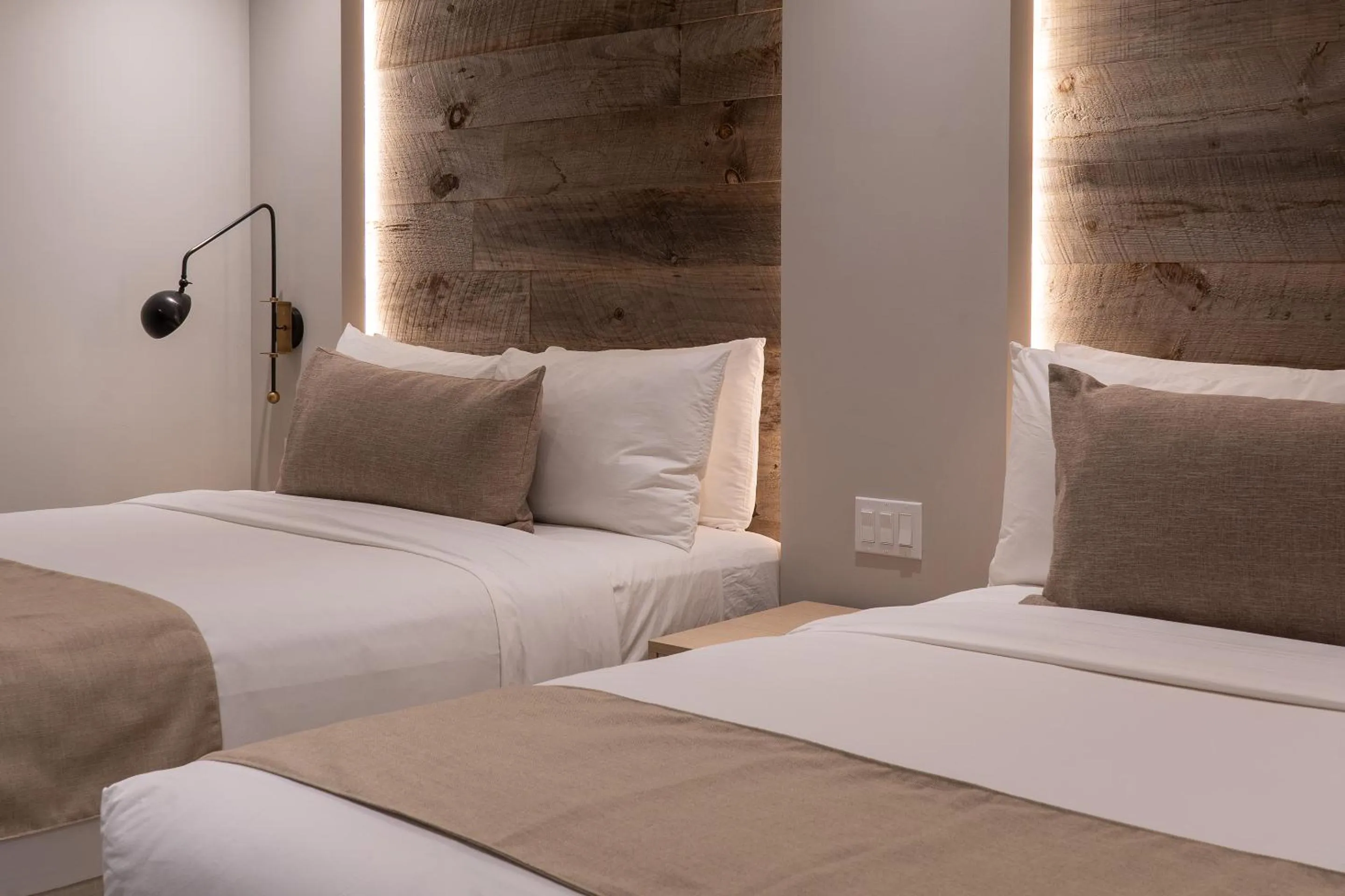 Bed in Nassau Suite South Beach, an All Suite Hotel