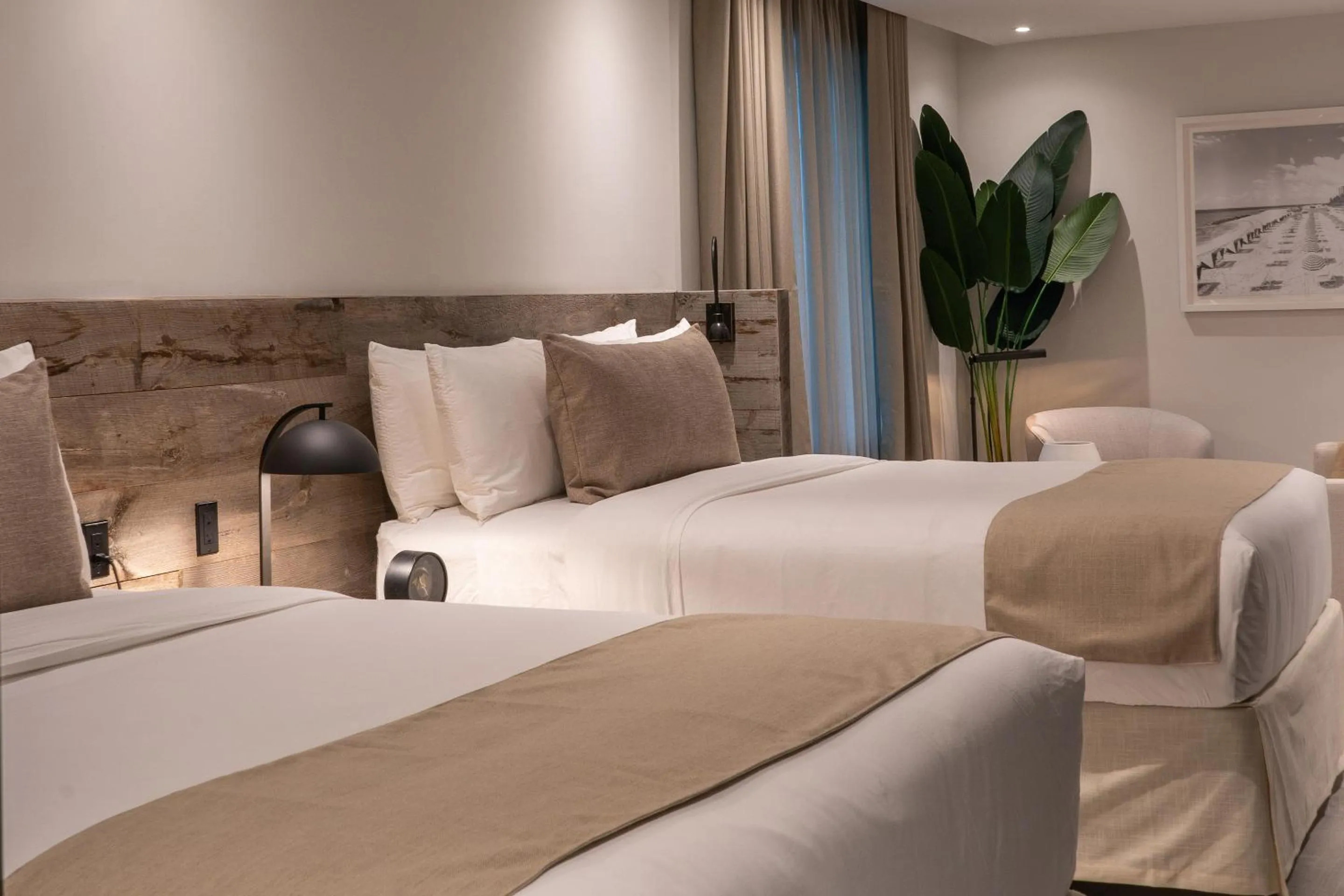 Bed in Nassau Suite South Beach, an All Suite Hotel