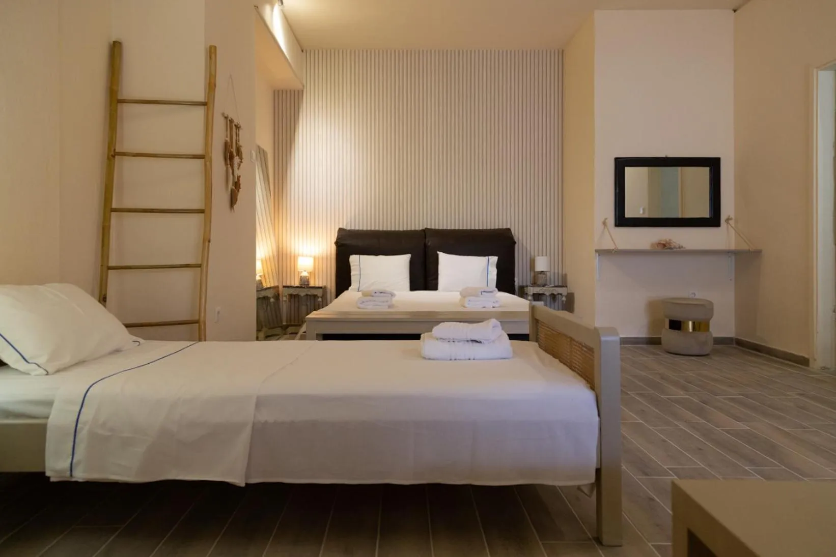 Bed in Poseidon Apartments and Villas by the Sea