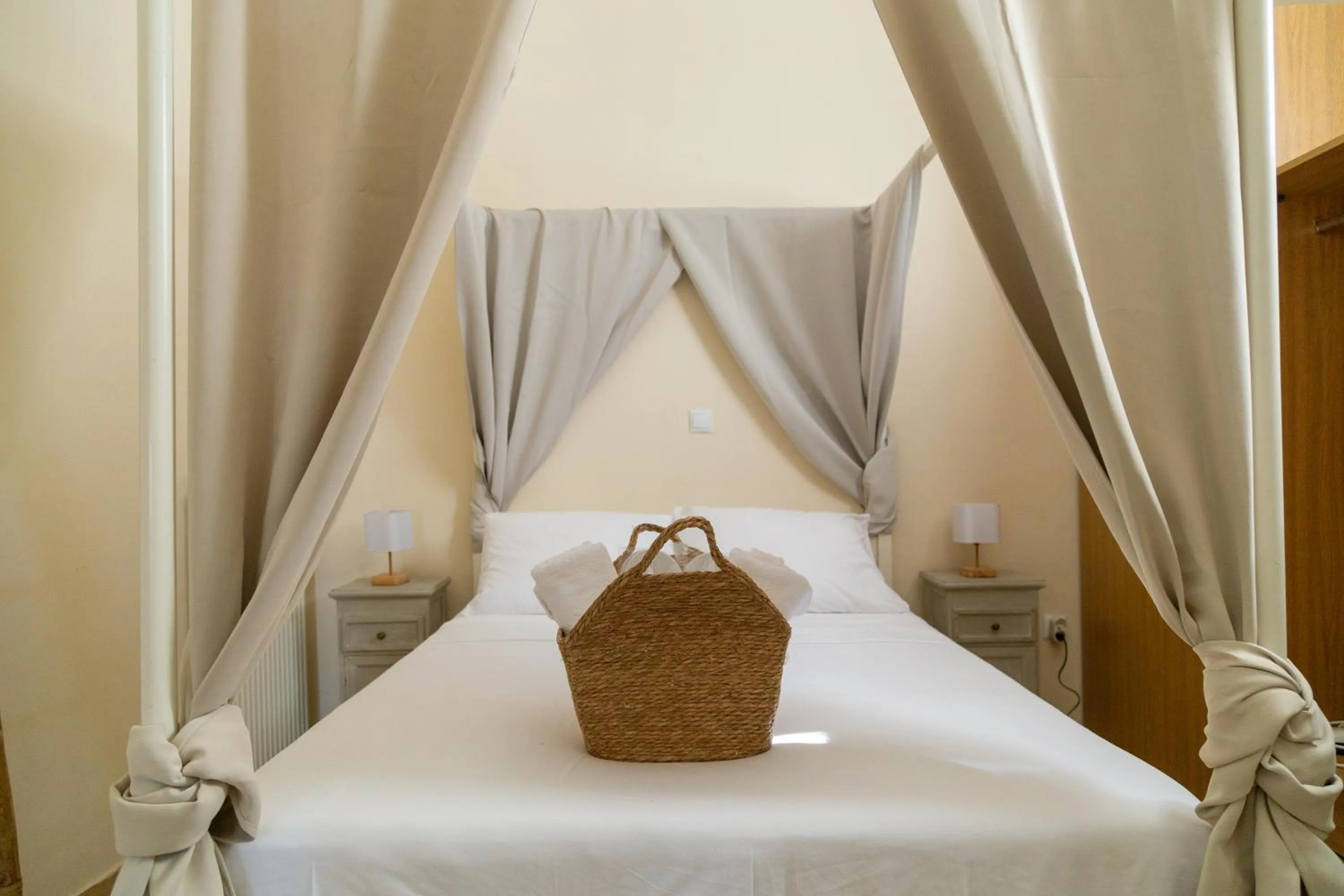 Bed in Poseidon Apartments and Villas by the Sea