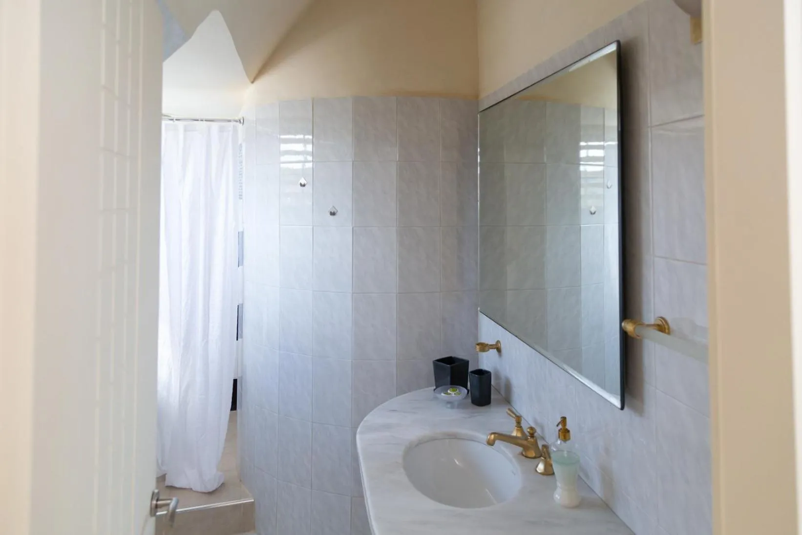 Bathroom in Poseidon Apartments and Villas by the Sea