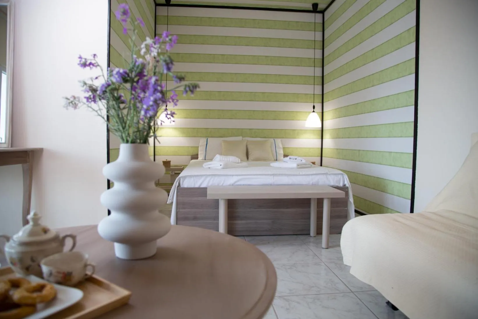 Bed in Poseidon Apartments and Villas by the Sea