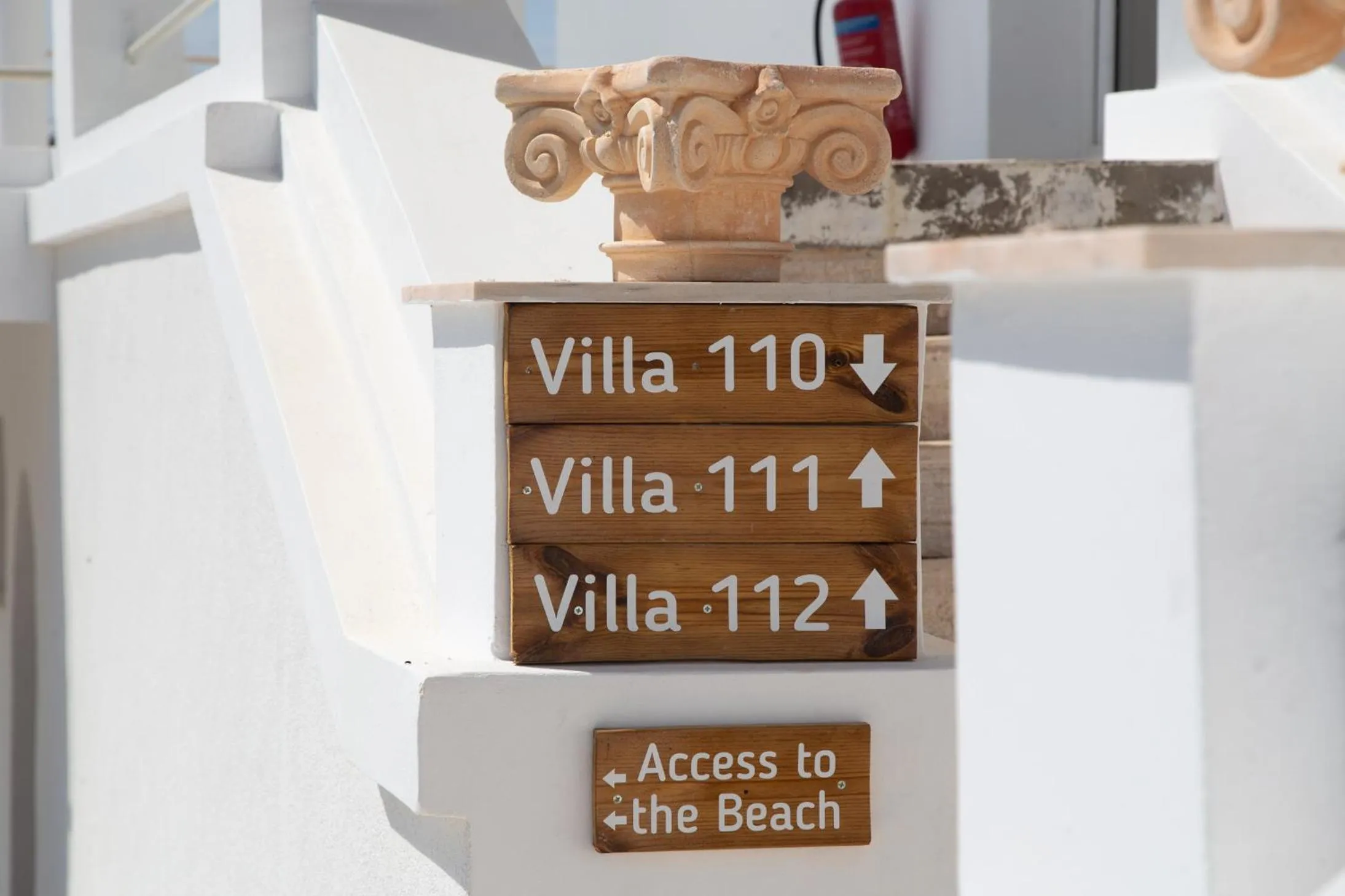 Property logo or sign in Poseidon Apartments and Villas by the Sea