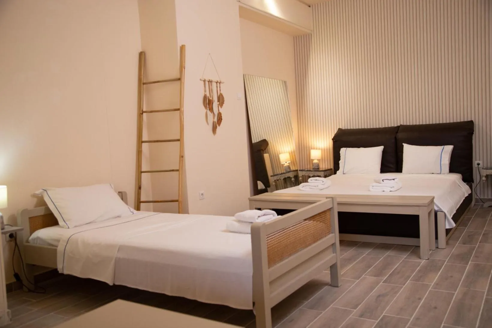 Bed in Poseidon Apartments and Villas by the Sea