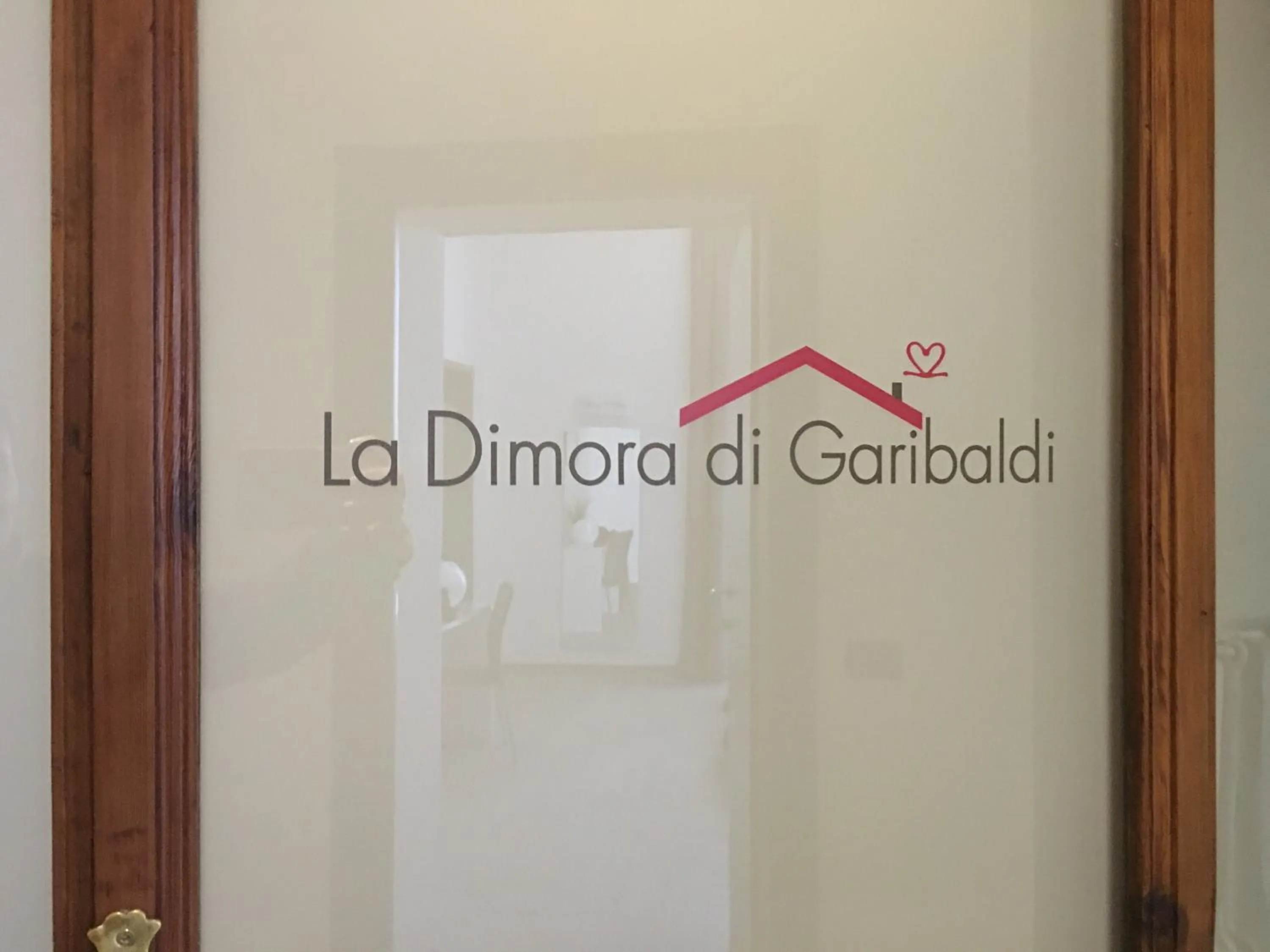 Property logo or sign in La Dimora di Garibaldi
