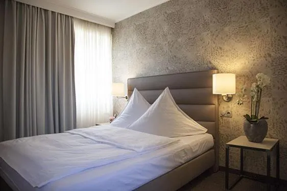 Bed in Hotel Fischerhaus