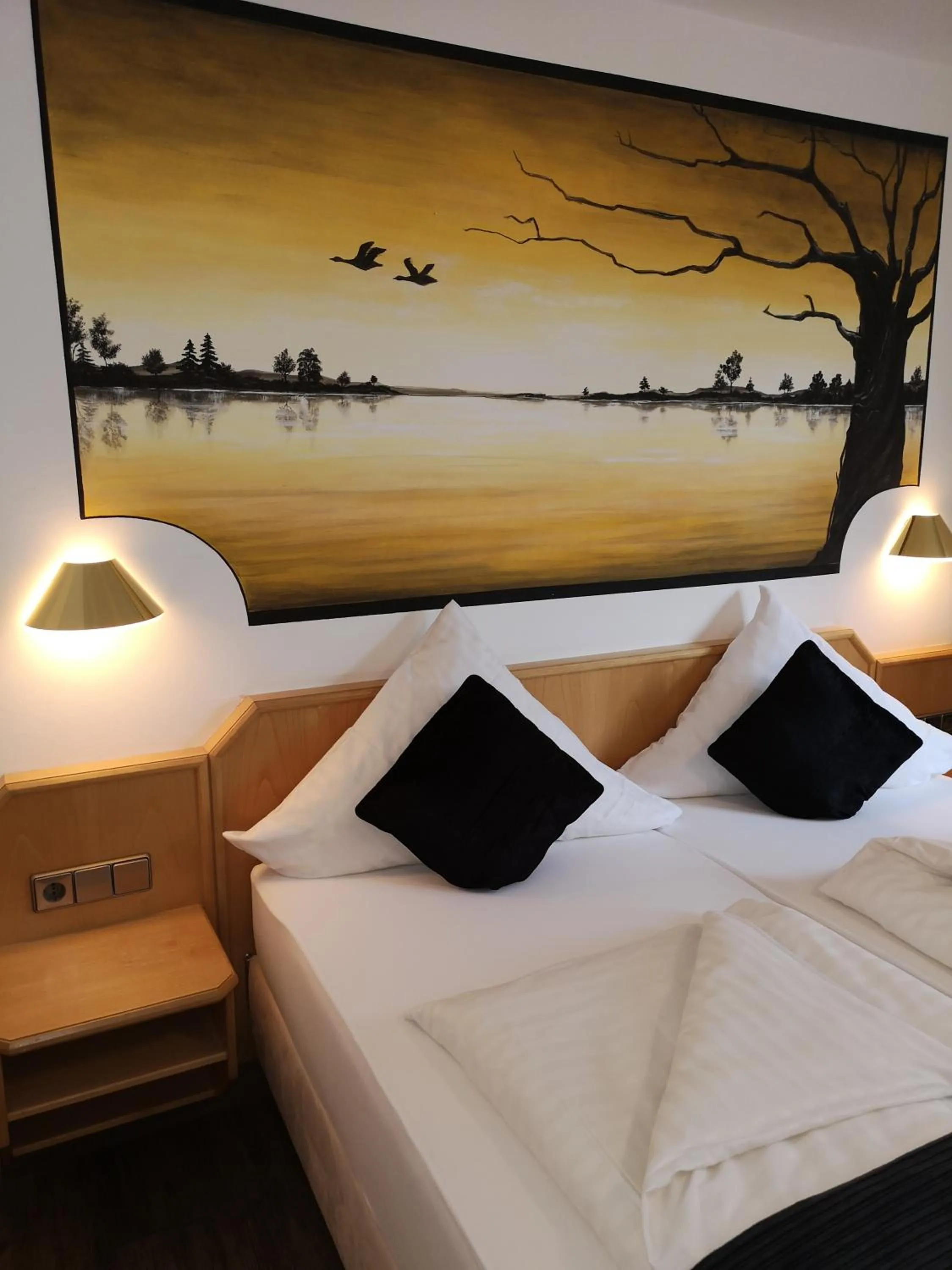 Bed in Hotel DreiKönig & Restaurant SeeGourmet