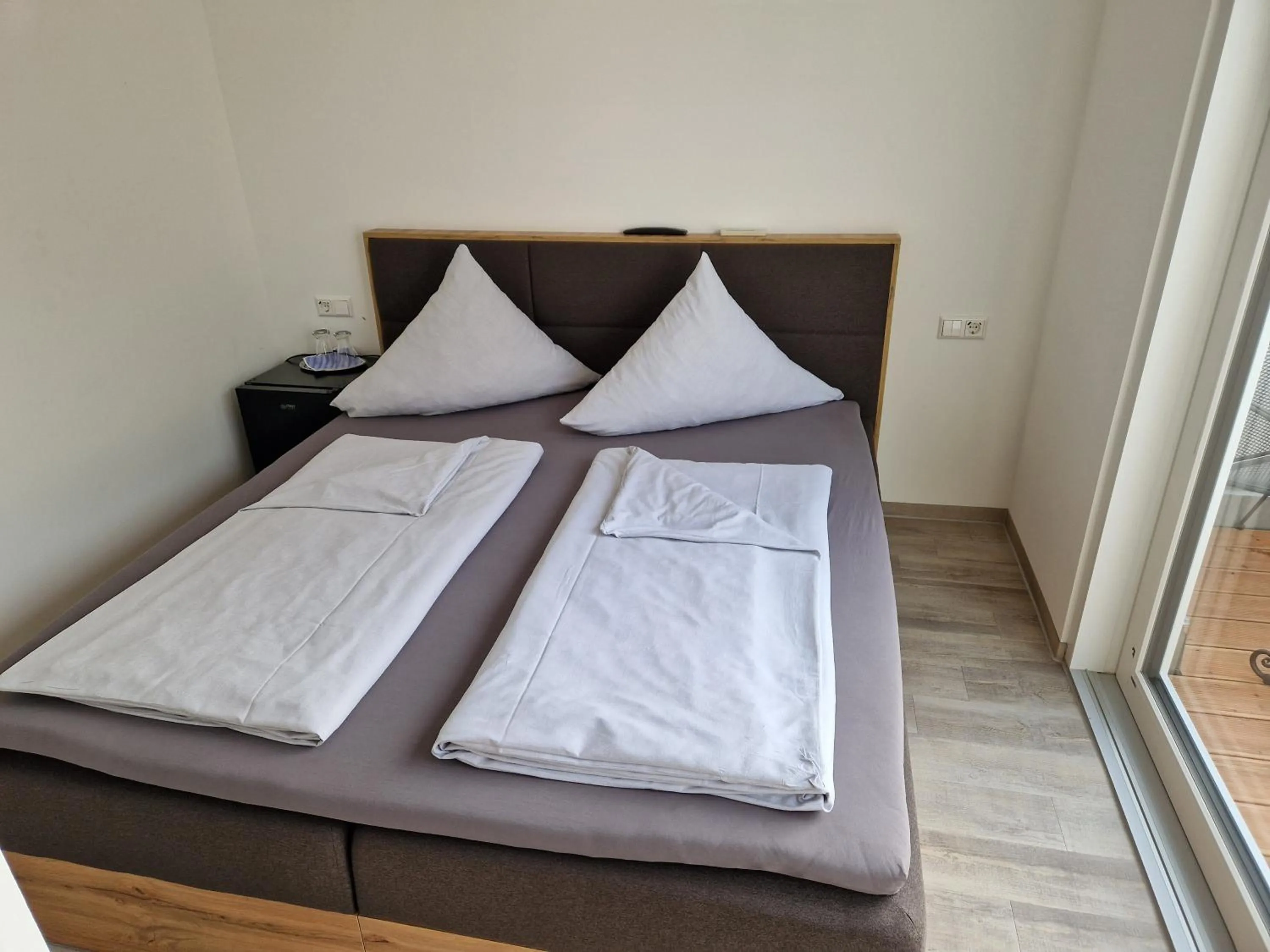 Bed in Hotel DreiKönig & Restaurant SeeGourmet