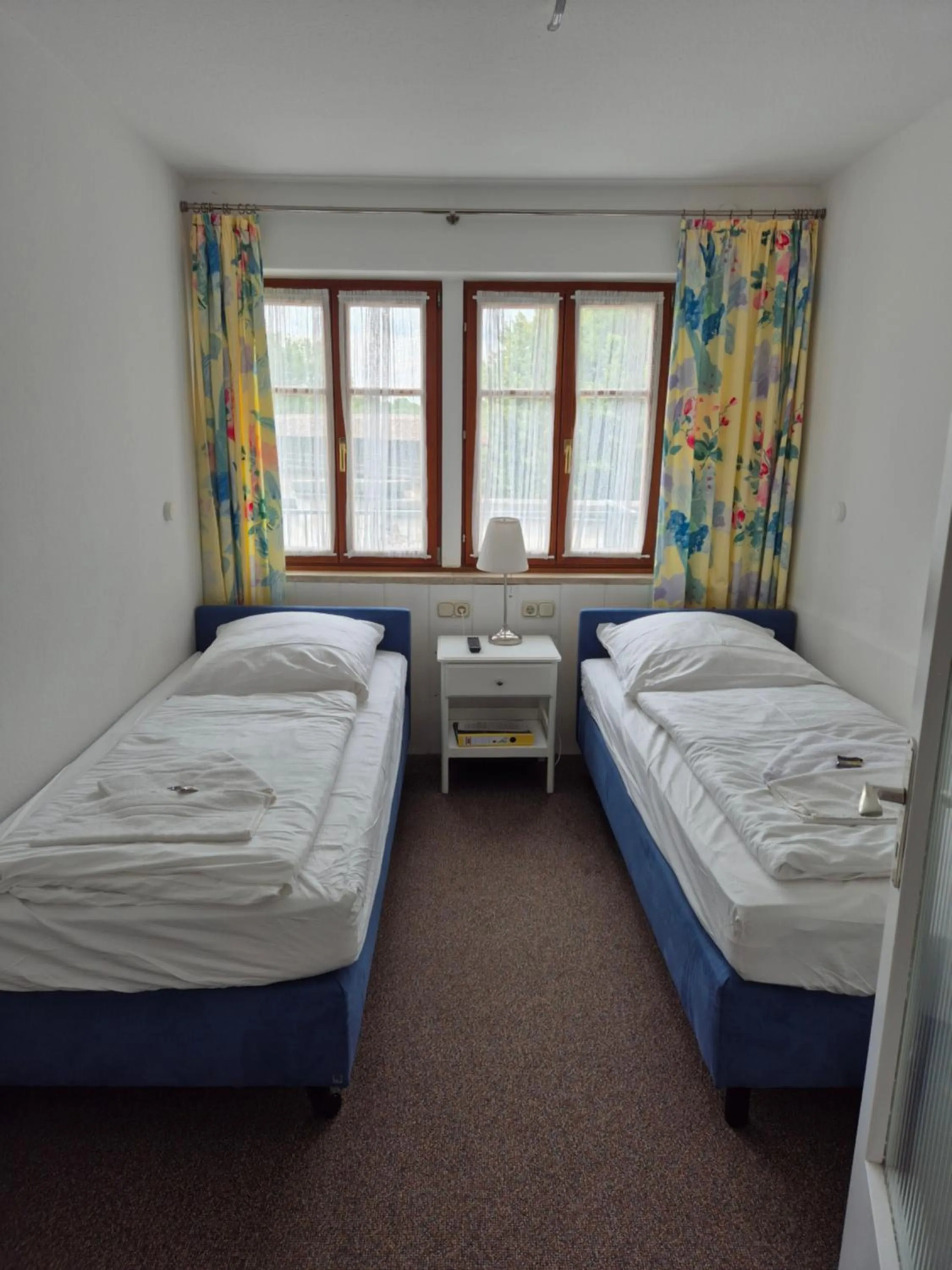 Photo of the whole room, Bed in Boutiquehotel Goldene Rose - self-check-in