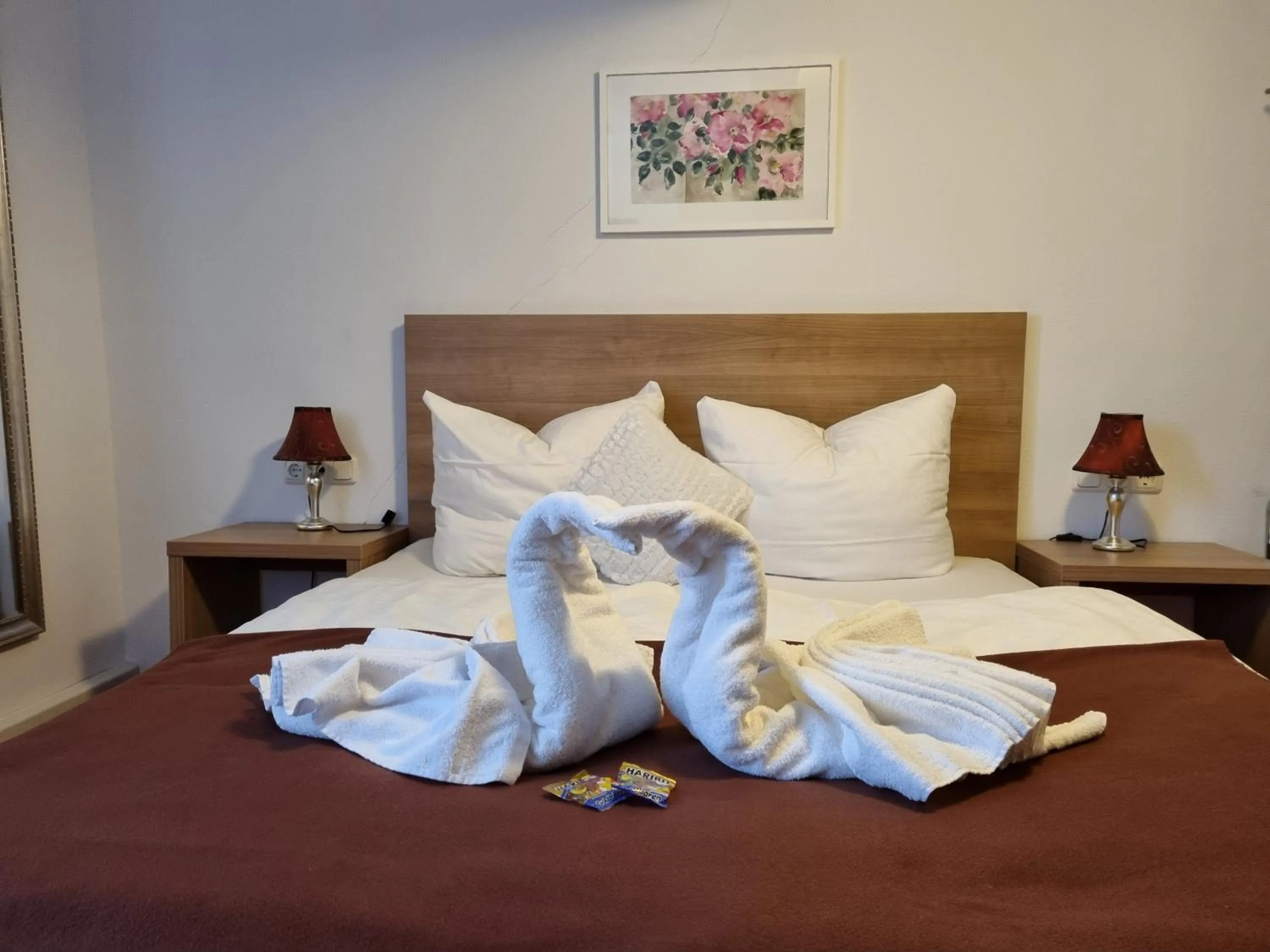 Bed in Boutiquehotel Goldene Rose - self-check-in