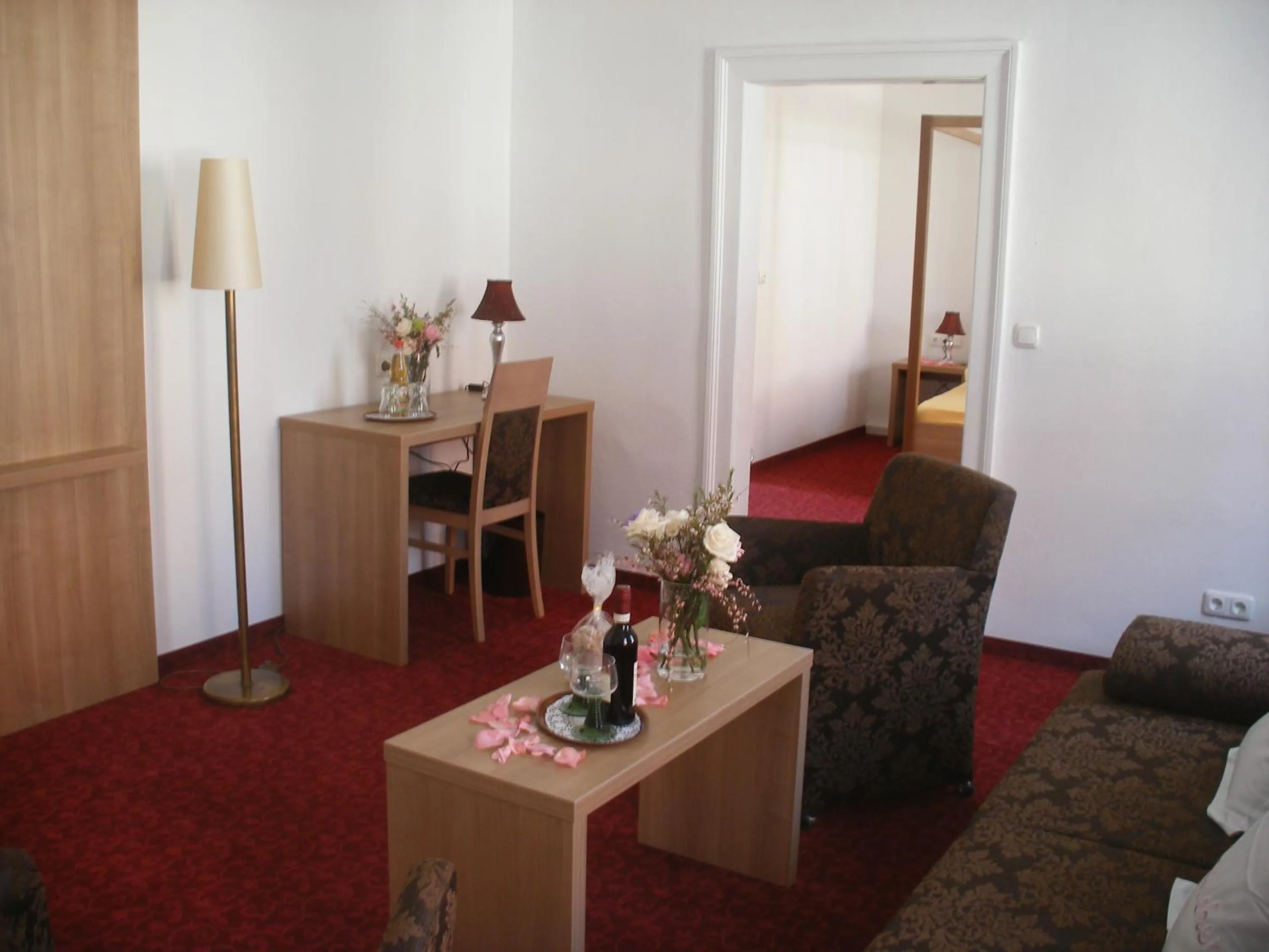 Photo of the whole room in Boutiquehotel Goldene Rose - self-check-in