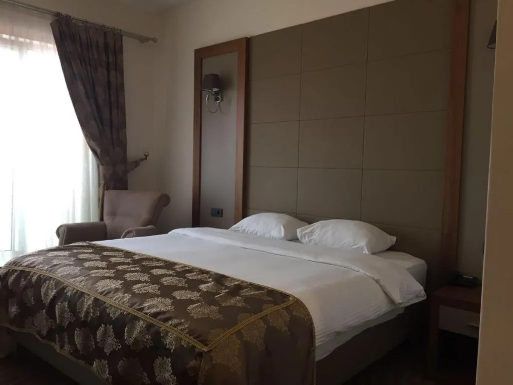 Bed in YZE Pırlanta Hotel