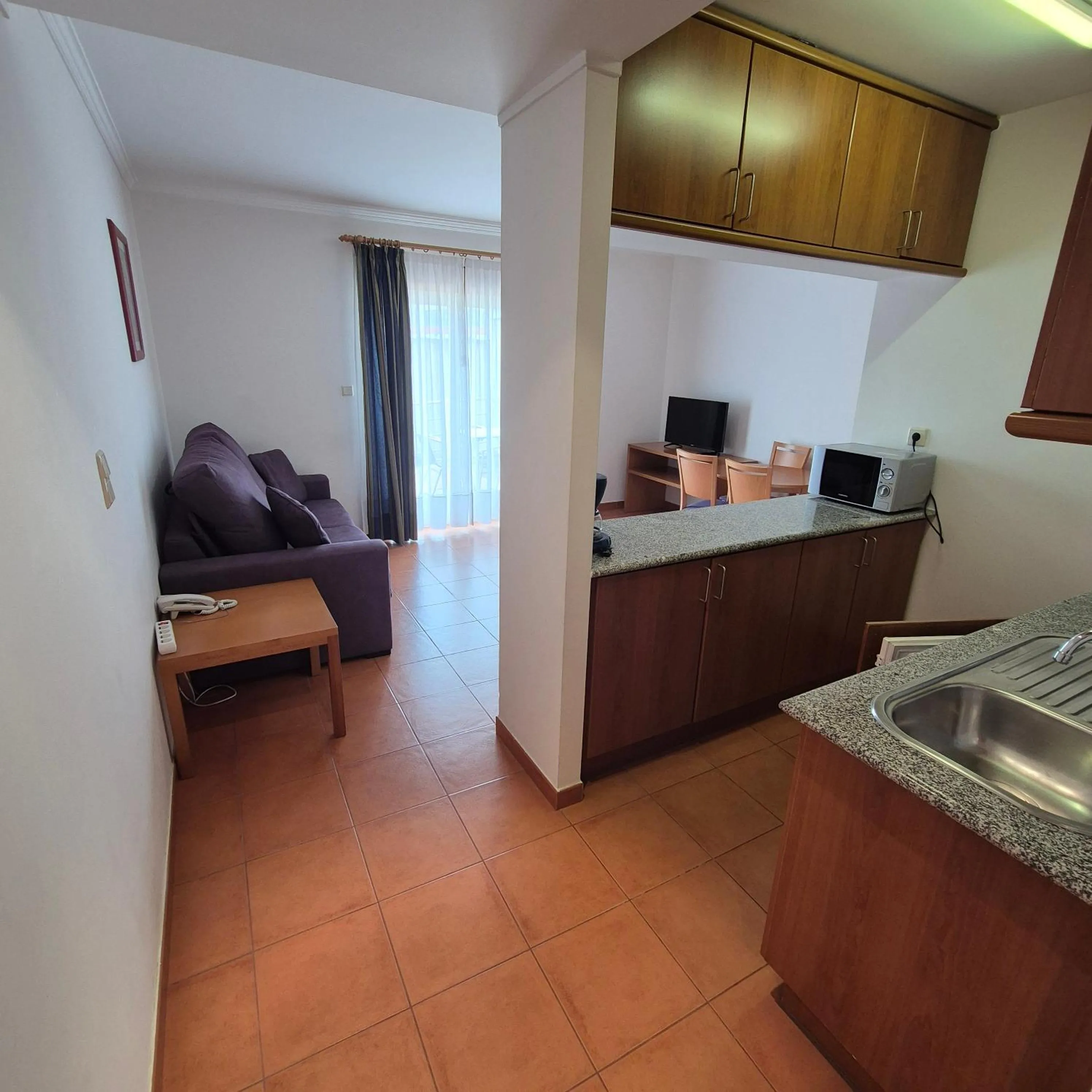 TV and multimedia in Apartamentos Turísticos Vila Praia