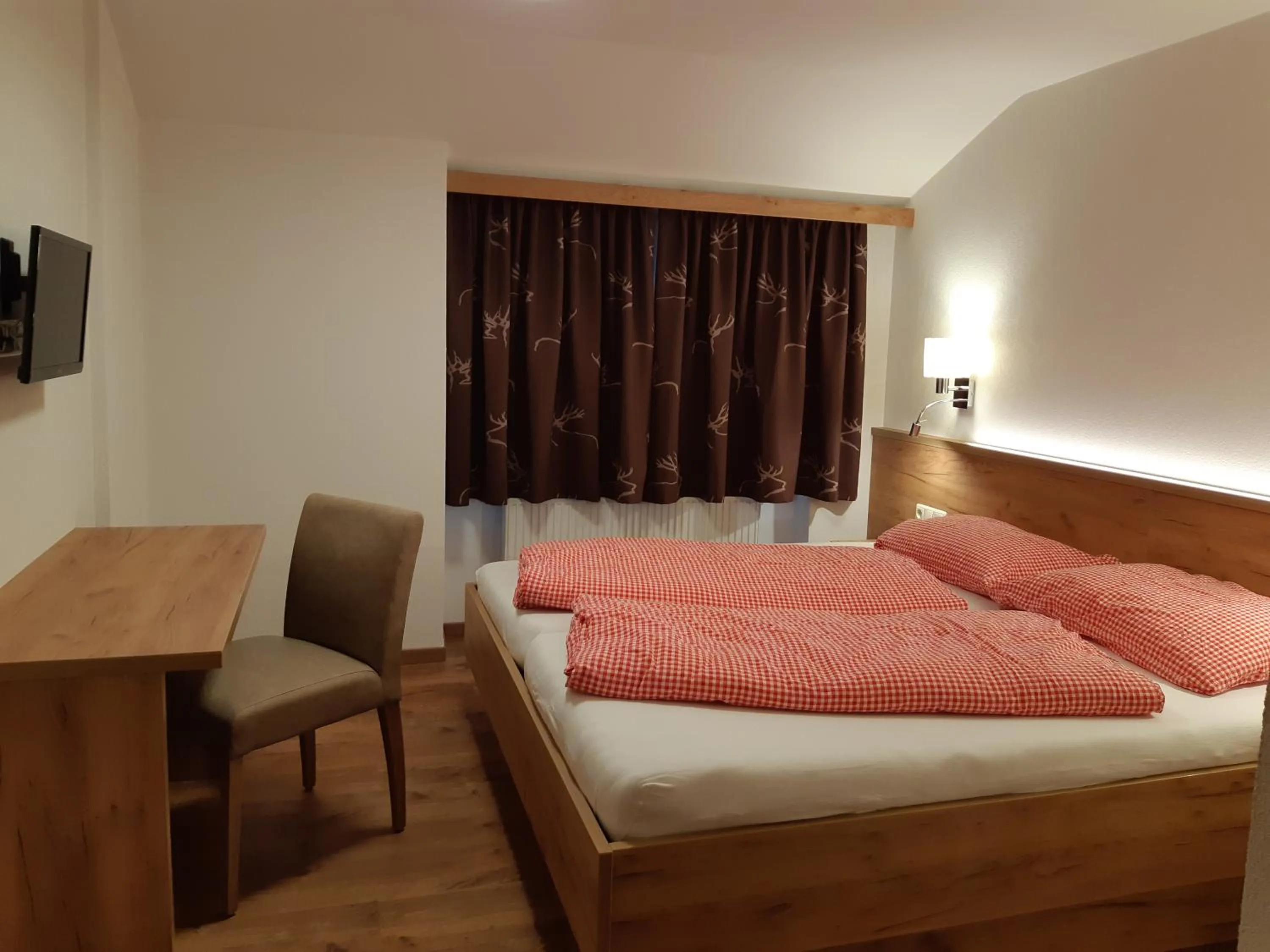 Bed in Pension Thainerhof