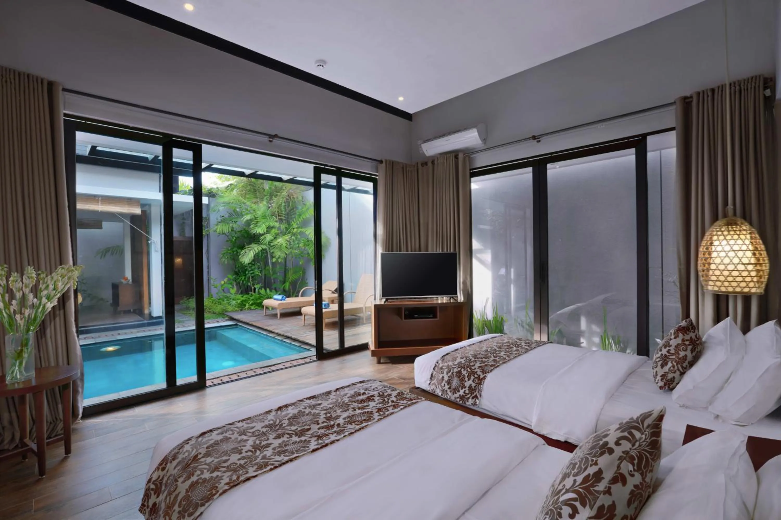 Bed in Kamuela Villa Lagoi Bay Bintan